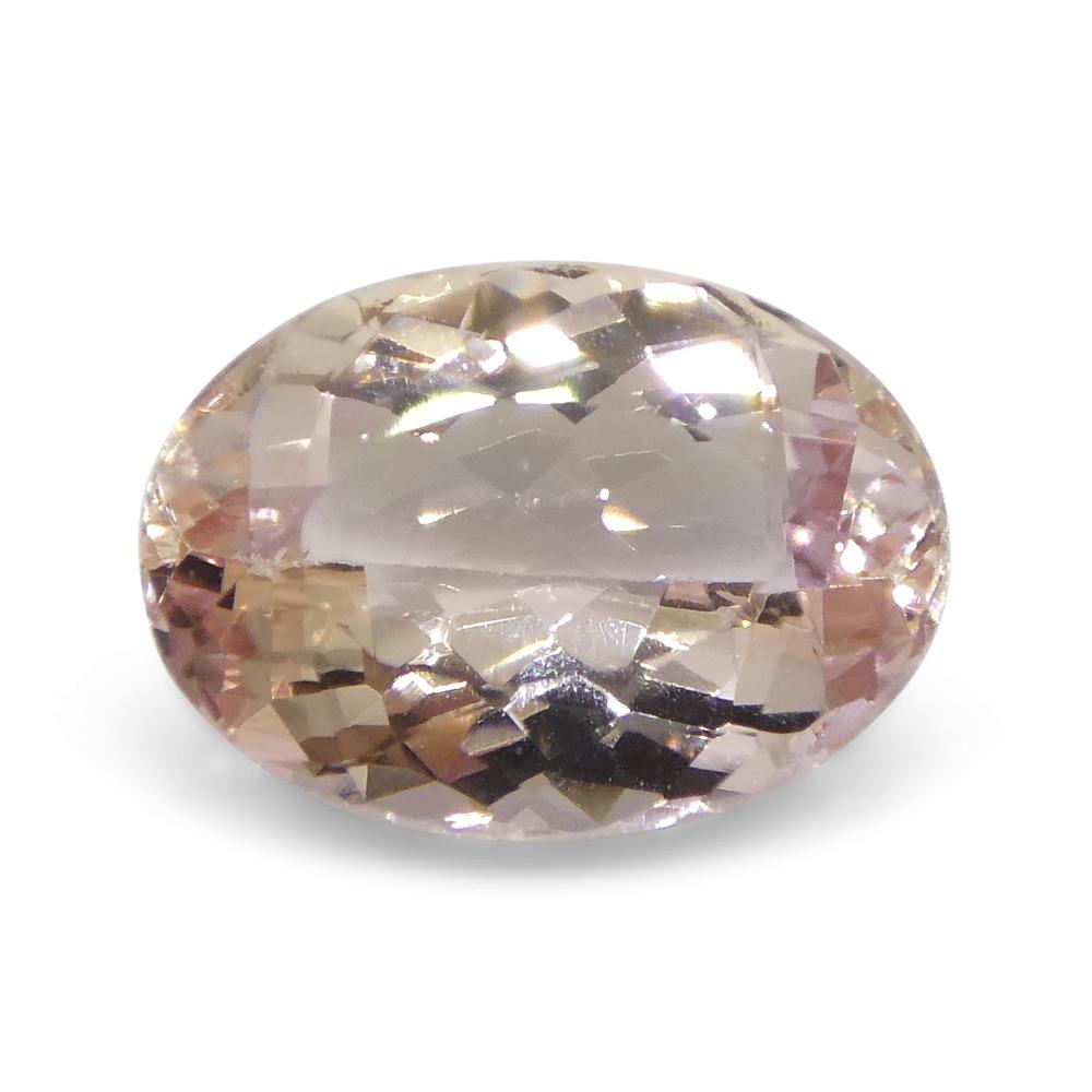 1.5ct Oval Orange-Pink Imperial Topaz GIA Certified 6