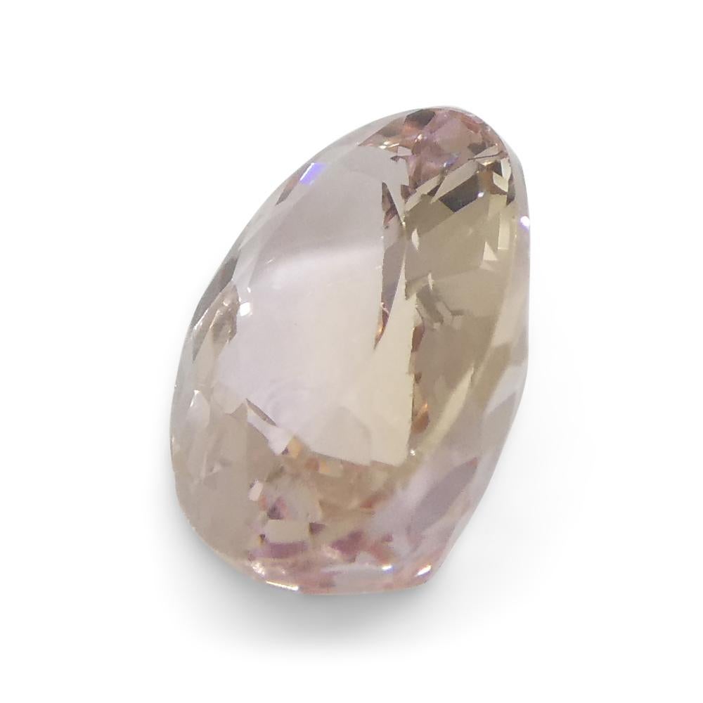 1.5 Carat Oval Orange-Pink Topaz GIA Certified For Sale 9