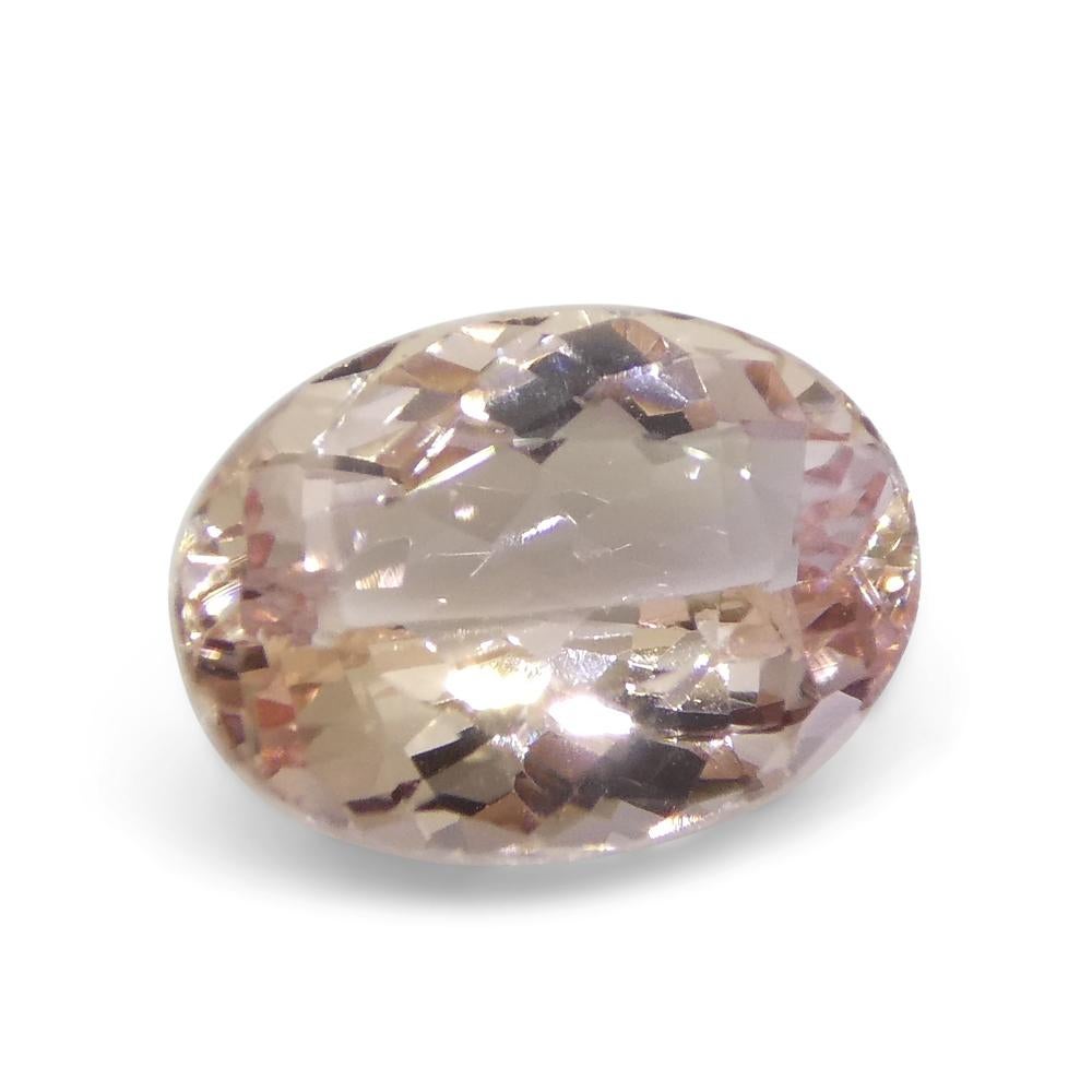 1.5ct Oval Orange-Pink Imperial Topaz GIA Certified For Sale 15