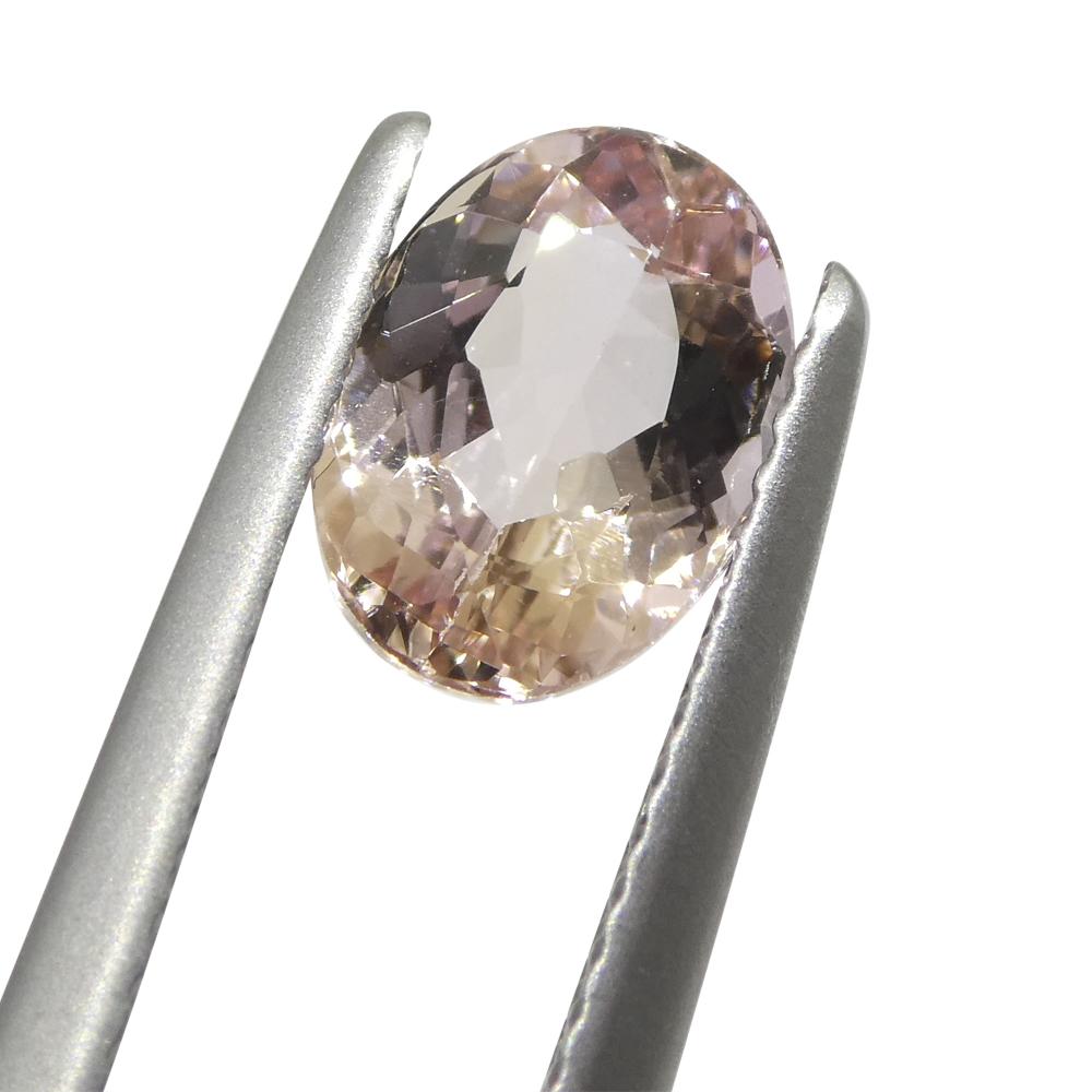 1.5ct Oval Orange-Pink Imperial Topaz GIA Certified For Sale 1