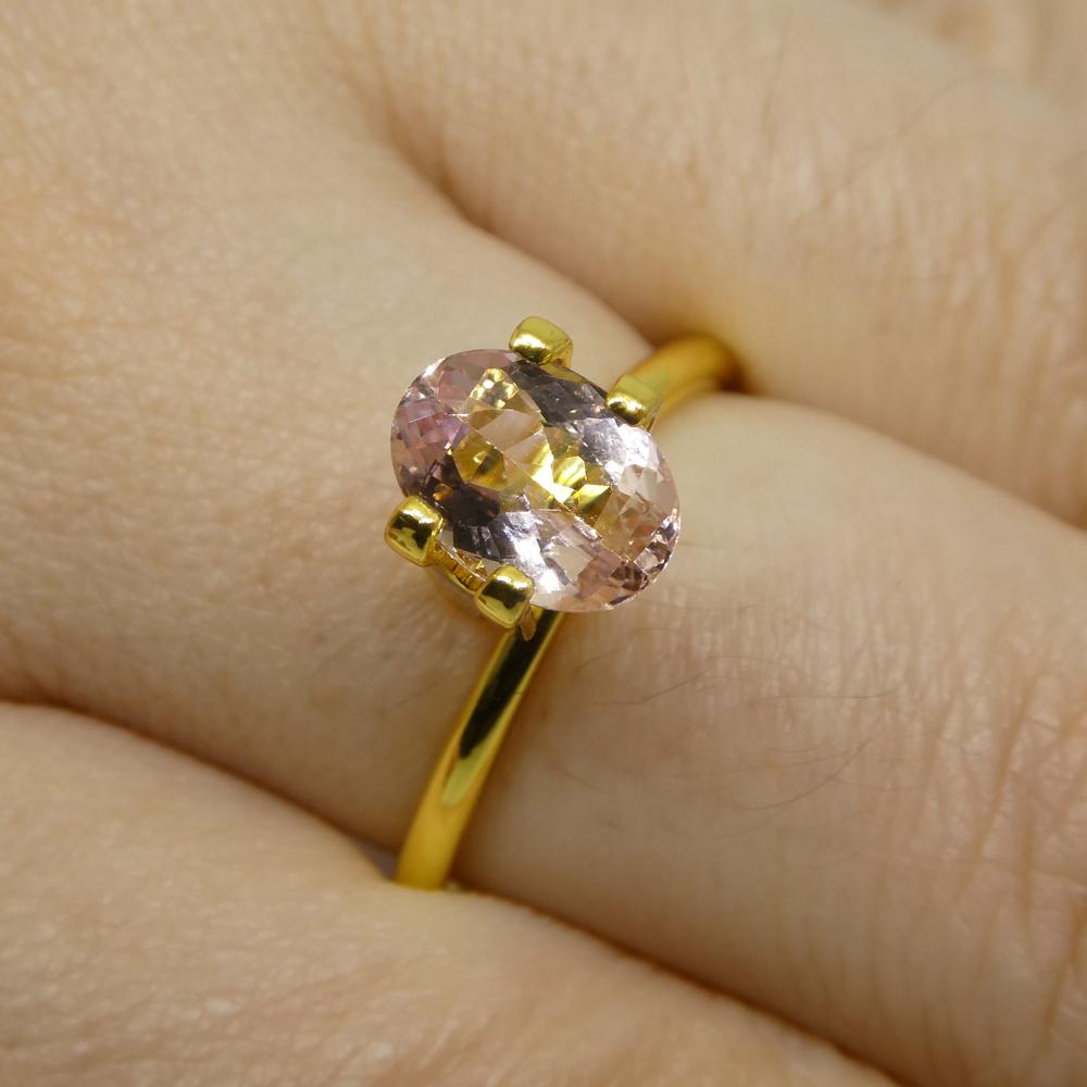 1.5ct Oval Orange-Pink Imperial Topaz GIA Certified For Sale 2
