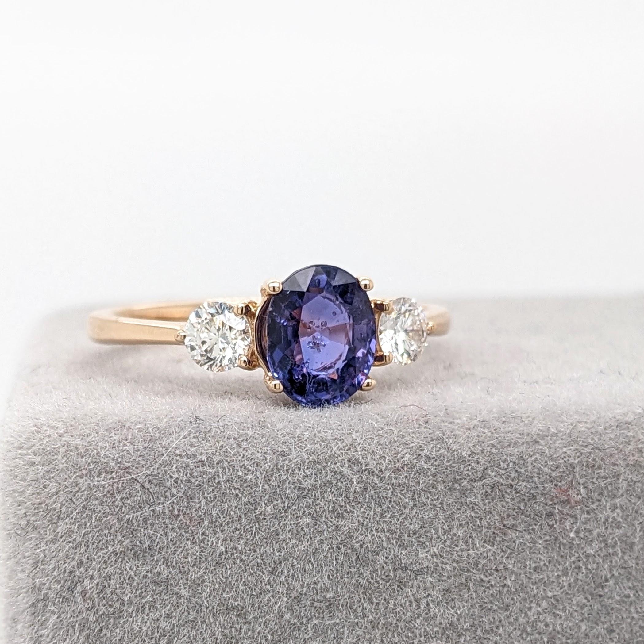 This ring features a beautiful oval cut purple sapphire in a cute NNJ Designs ring setting with 2 natural round diamond accents on both sides all set in 14k yellow gold.

Specifications

Item Type: Ring
Centre Stone: Purple Sapphire
Treatment: