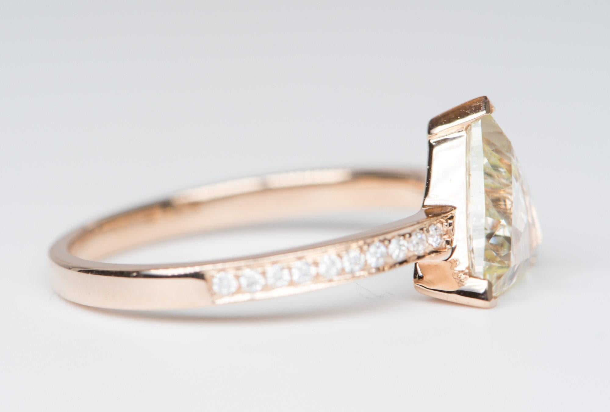 â™¥ Solid 14K rose gold engagement ring set with a trillion rose cute clear diamond on a diamond half eternity pave band
â™¥ This stunning clear colorless diamond has excellent transparency 
â™¥ The overall setting measures 10.1mm in width, 8.8mm in