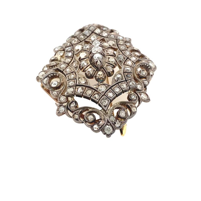 15ct Rose Gold & Silver Brooch Set With Victorian Rose Cut Diamonds.

Additional Information:
Pre WW2 Antique 15ct Rose Gold & Silver Brooch Set With Victorian Rose Cut Diamonds
Total  Gold Weight: 6g
Total Silver Weight: 12g
Total Diamond Weight: