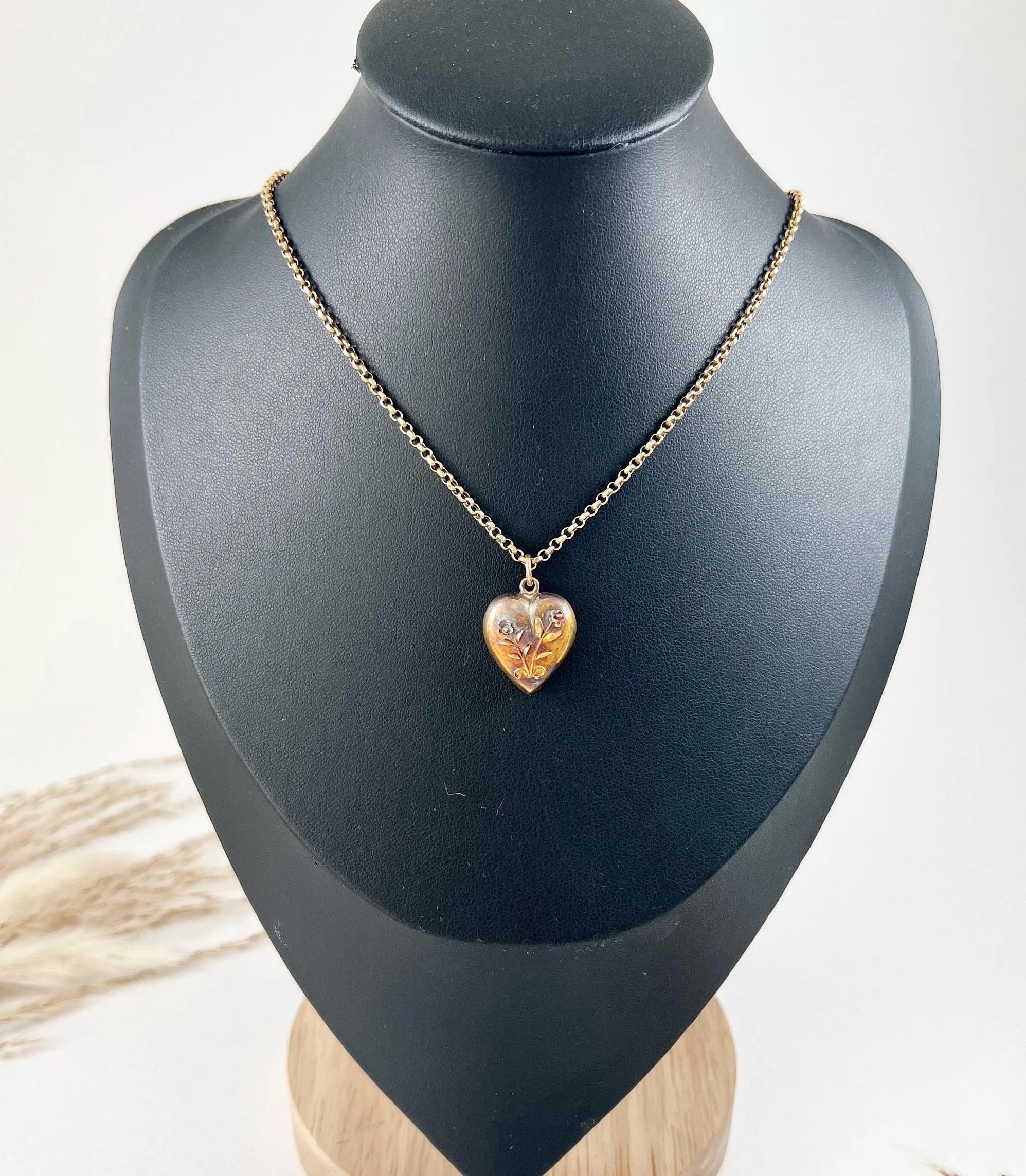Antique Heart Pendant 

15ct Yellow Gold Stamped

Circa 1880 

Introducing our lovely 15ct yellow gold Victorian puffy heart pendant charm. This timeless piece exudes elegance and would make a lovely addition to any antique jewellery collection. We