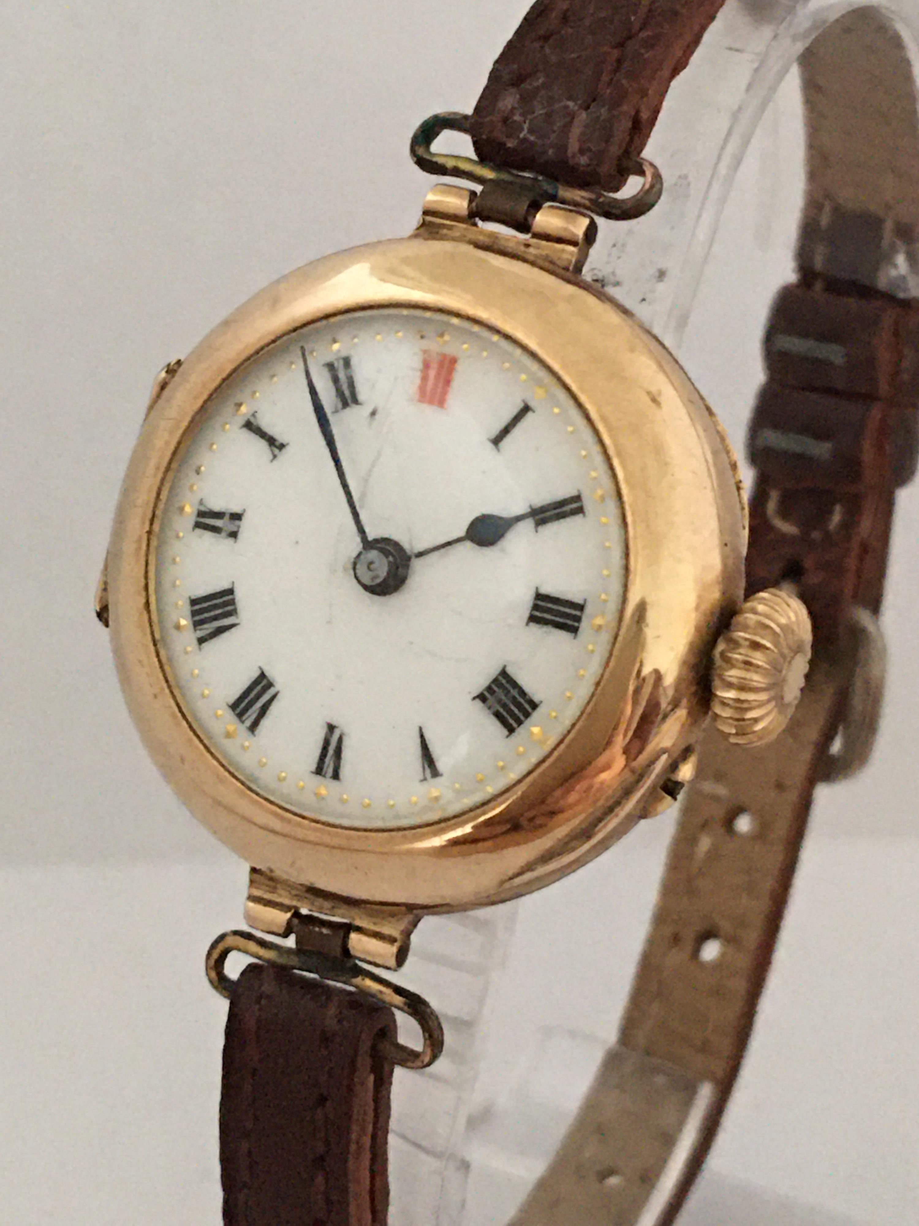 This beautiful antique gold Ladies trench watch is working and it is ticking well. However, due to its age I cannot guarantee the time accuracy (12mins slow a day). Visible signs of wearing. The old brown leather strap is a bit worn but wearable.