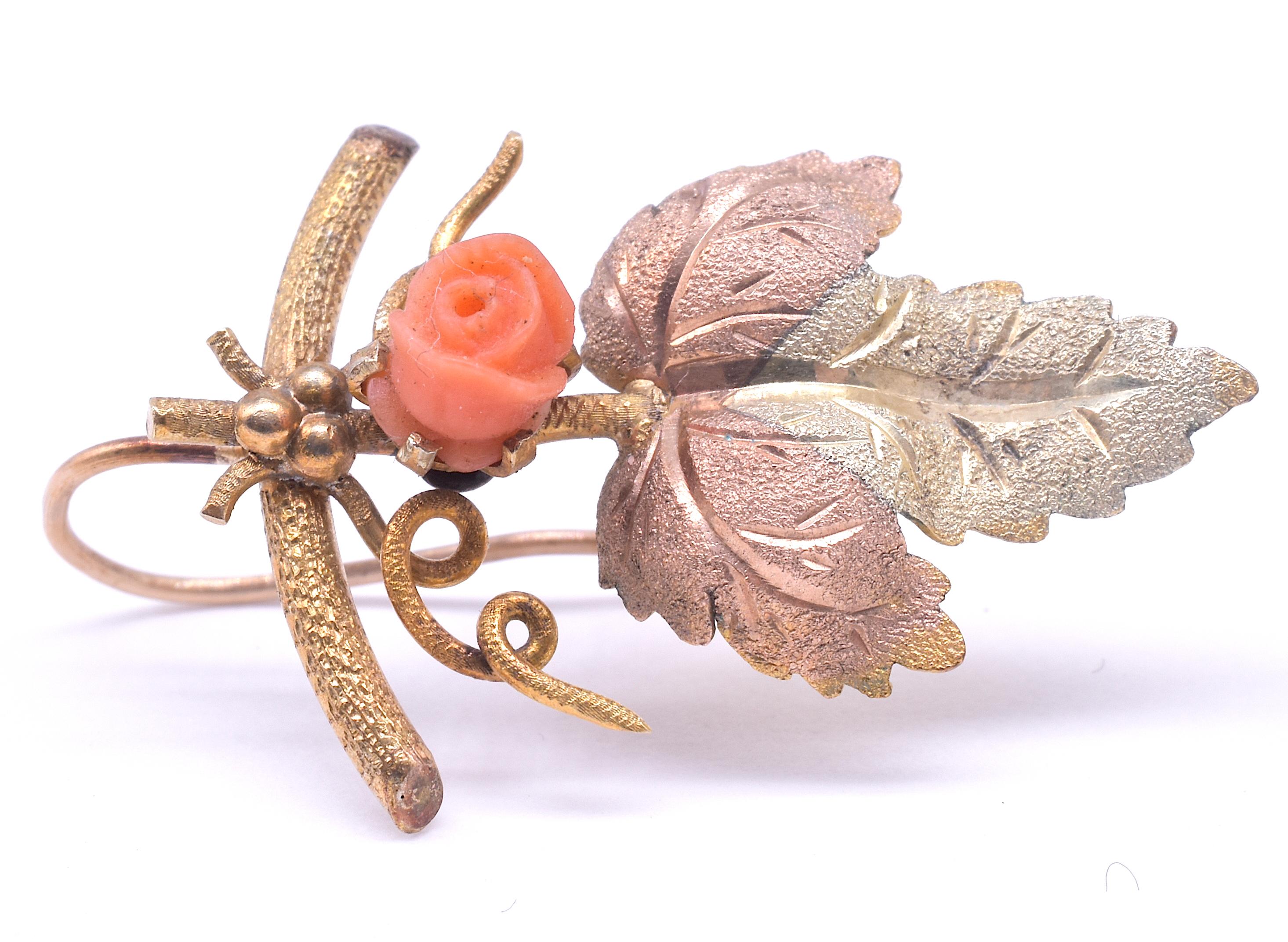 We love these late Victorian 2 color gold coral earrings and the contrast between the yellow gold and rose gold of the three leaf arrangement. Each leaf is topped with a single coral rose. The leaf form is espaliered to a 15K textured gold 