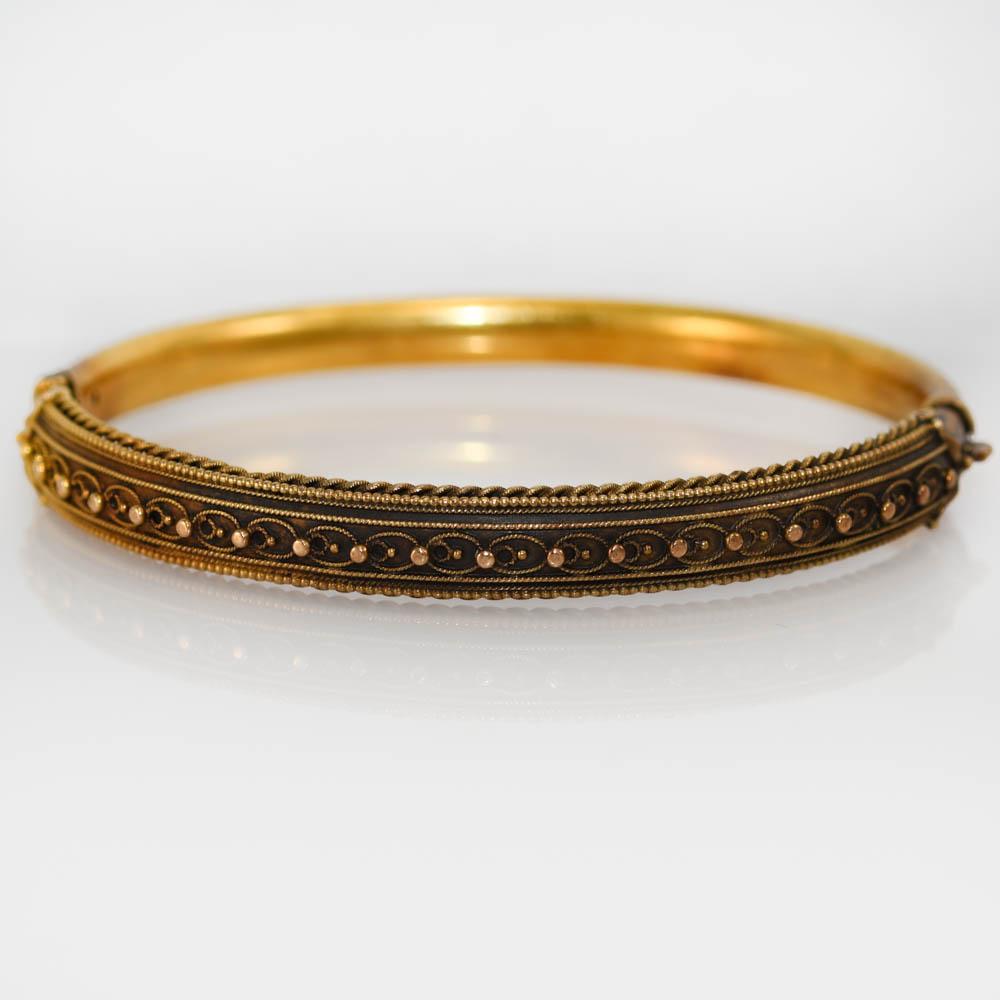 15K Yellow Gold Antique English Bangle Bracelet, 11g
Antique English bangle bracelet in 15k yellow gold.
Stamped 15ct and weighs 11 grams.
Inside the bracelet is engraved 
