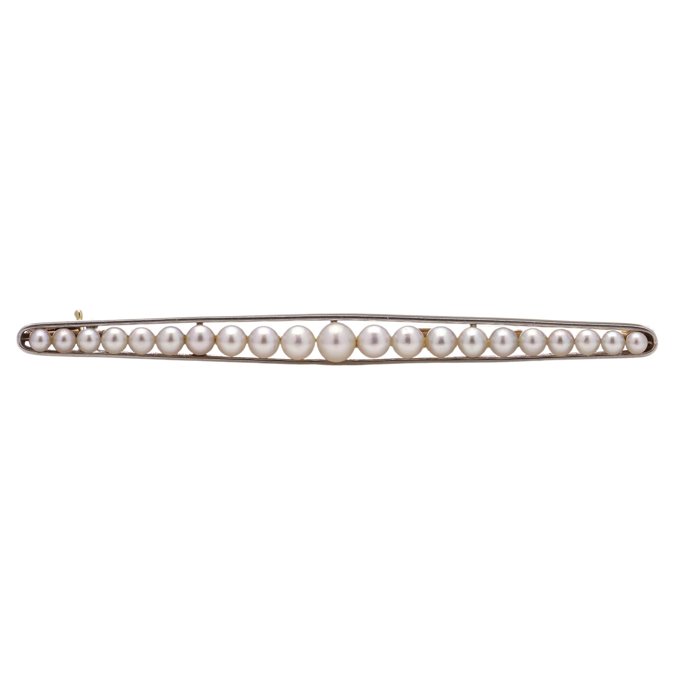  15kt. yellow gold and platinum elongated brooch with pearls 