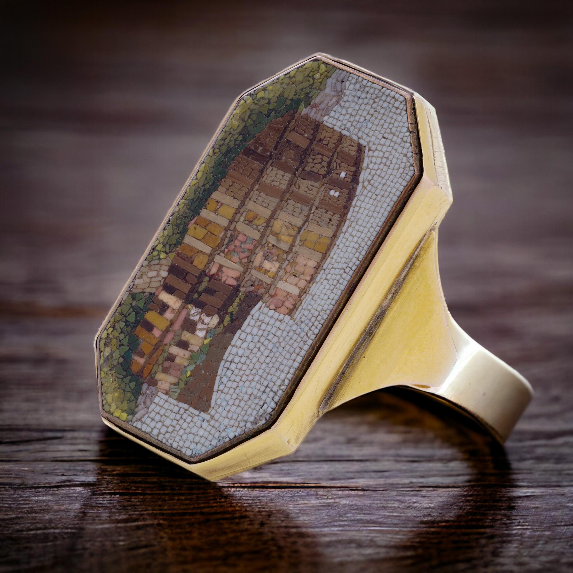 Antique 19th century 15kt. yellow gold men's micro mosaic ring featuring the Colosseum in Rome.
Made in Italy, Circa 1870's
X-Ray has been tested positive for 15kt. yellow gold.

The dimensions -
Ring Size: Length x Width x depth: 3.5 x 3 x 1.2