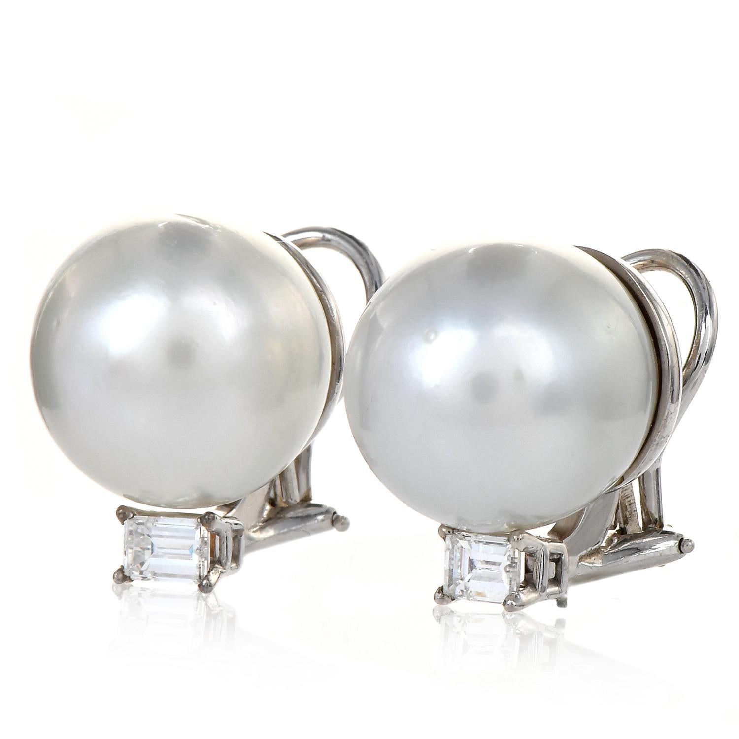 These glamorous jumbo South sea pearls earrings are in solid 14K white gold.  South Sea Pearls measuring 15mm, white-silver undertones,  and minimum blemishes.

Topped by (2) baguettes-cut, Well-matched extra white fiery Diamonds weighing