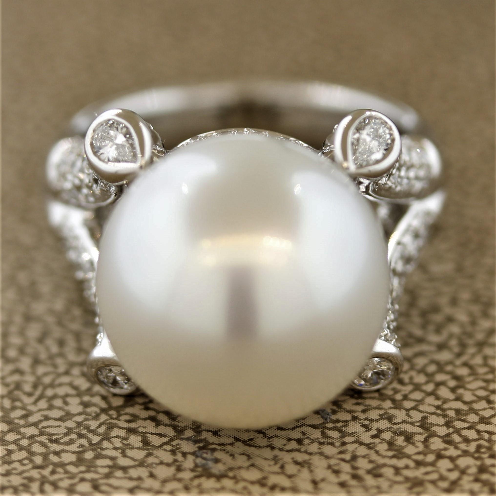 A large and impressive South Sea pearl! It measures 15mm in size and has excellent luster as light rolls off its surface, and it is free of any blemishes or pits. It is accented by 1.09 carats of round brilliant cut diamonds along with 4 pear shaped