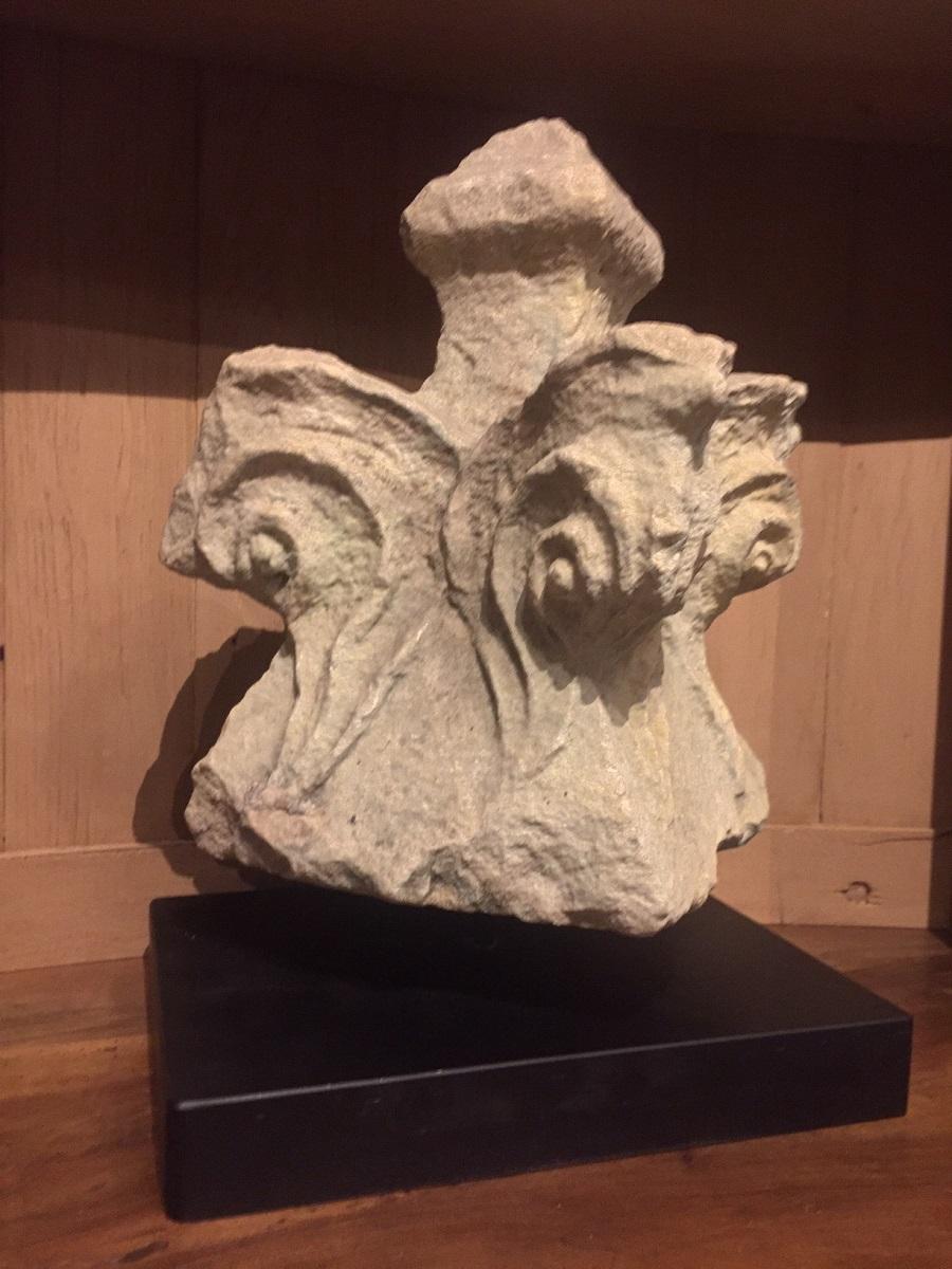 A French medieval finial in typical form. Finely sculpted in sandstone this ornament would have been positioned on top of a tower or facade.
Presented on a custom made stand.