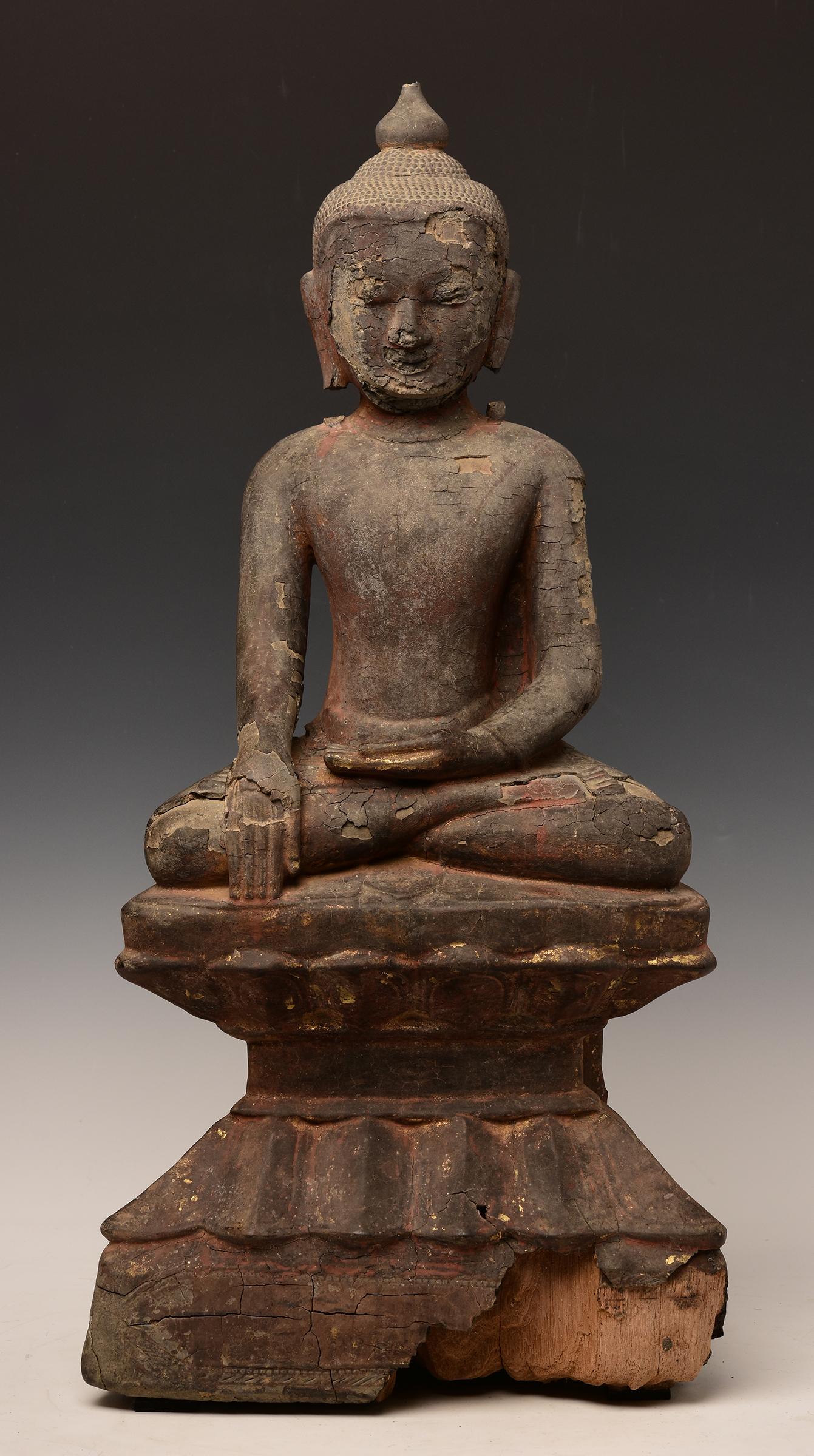 Burmese wooden Buddha sitting in Mara Vijaya (calling the earth to witness) posture on a base.

Age: Burma, Ava Period, 15th Century
Size: Height 60 C.M. / Width 29 C.M.
Condition: Intact with original condition.

100% Satisfaction and authenticity