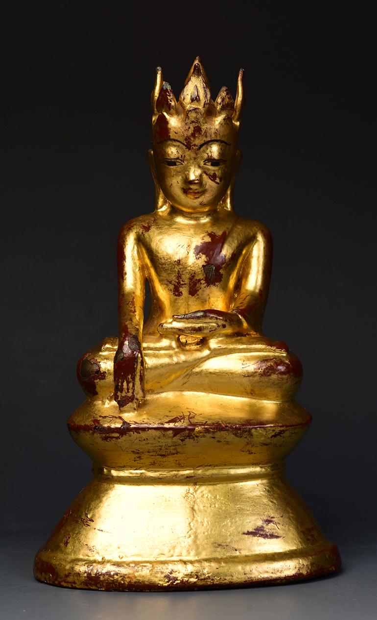 Rare Burmese bronze seated crowned Buddha on double base with gilded gold.

Crowned Buddha or sometimes known as 'King Buddha', represents the Buddha's role as a universal sovereign.

Age: Burma, Ava Period, 15th Century
Size: Height 22.3 C.M.