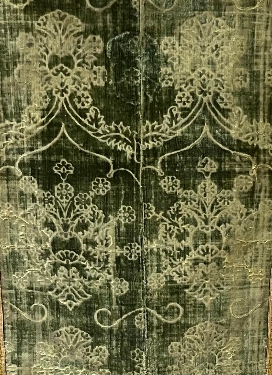 A panel of voided Olive Green silk velvet showing the Ferronerie pattern

Centre panel of a dismantled Chasuble

Florence or Venice dating from second half of the 15th Century

The silk and metallic braids are 17th century

This museum worthy