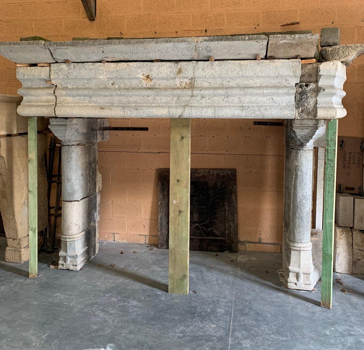 A monumental 15th century sandstone Gothic fireplace mantel. Finely sculpted with a moulded beam and column supports.
  