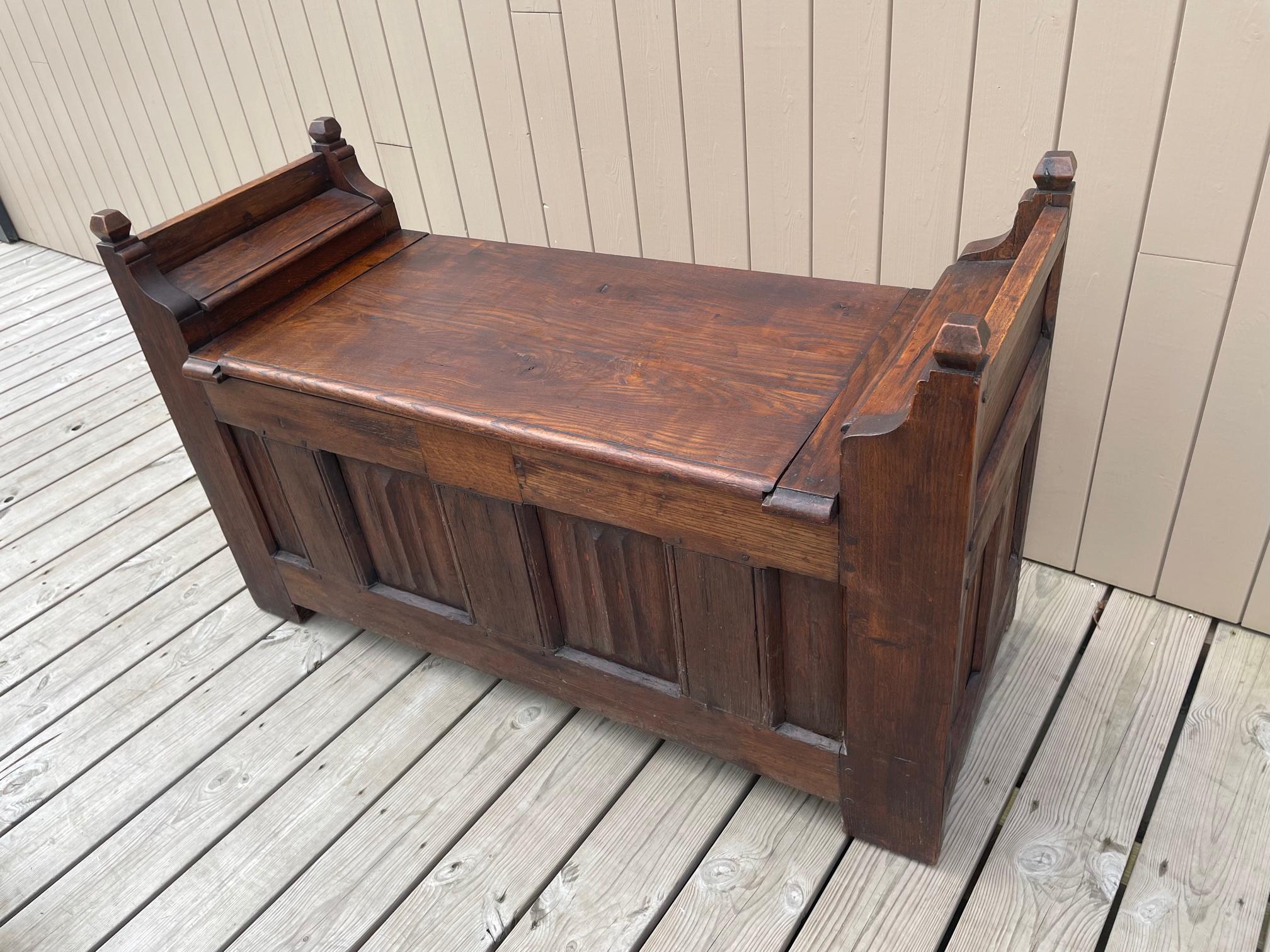 Exceptionnal 15th century French walnut gothic period Bench with a opening top (the fitting has been changed). 
Opening hatches on each sides. The front has been made with a specific way of fabrication called 