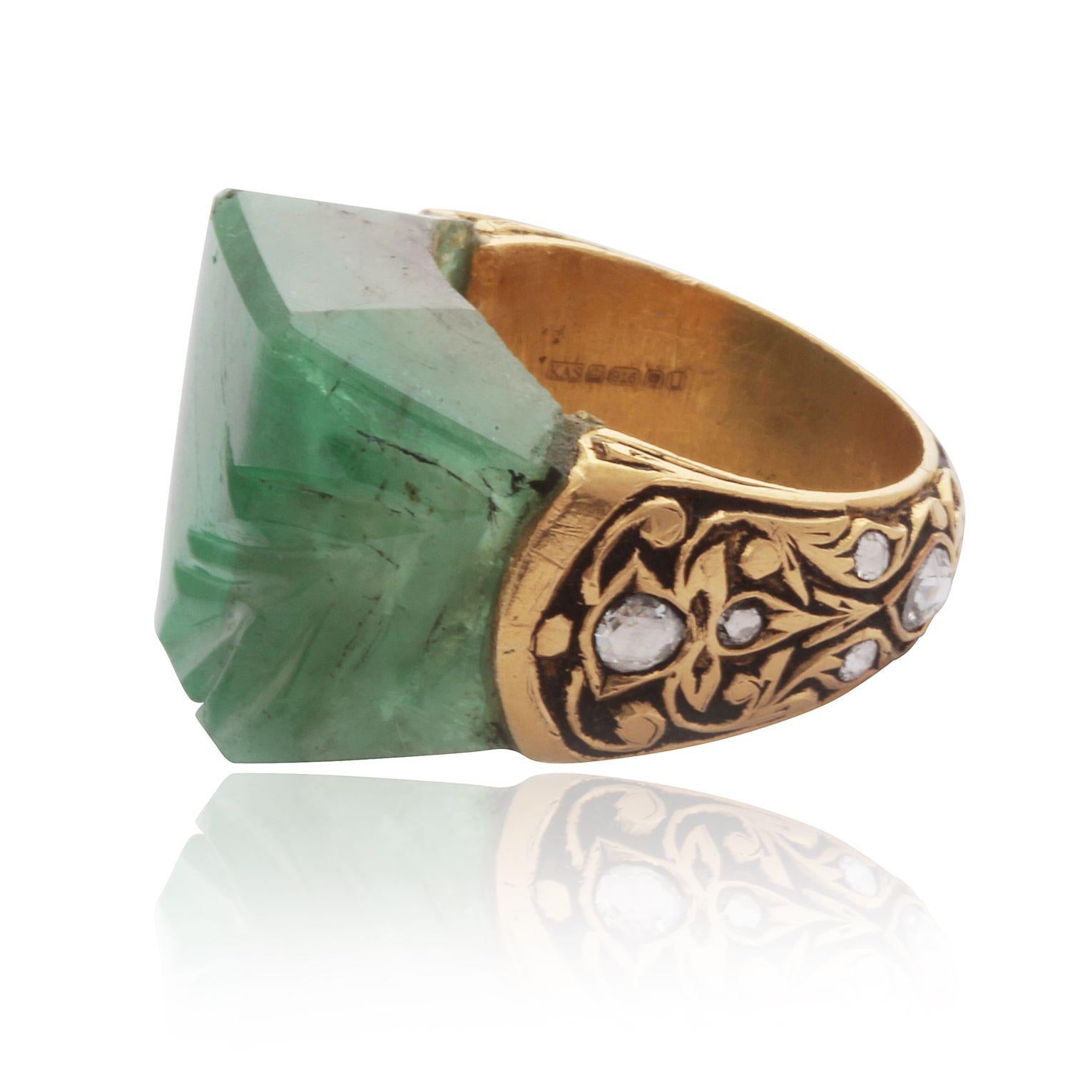 A work of art; an heirloom piece: featuring the 500 year old technique called ‘Partash’ hand inlaid work set on 22kt gold with natural rose cut diamonds and natural carved emerald. A one off piece.

25.34 carat of Emerald; 12.32 grams of 22kt gold ;