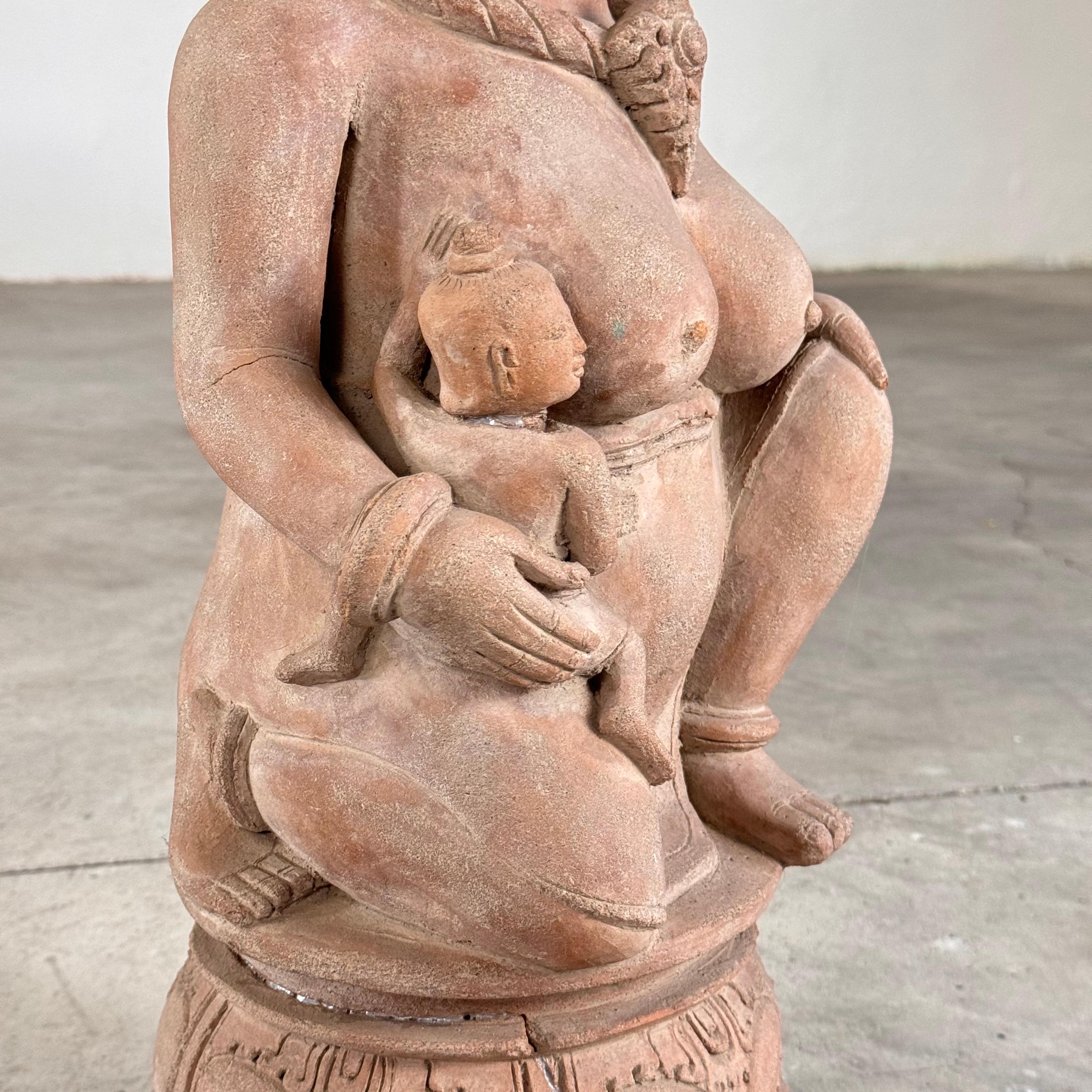 15th Century Majapahit Terracotta Handmaiden Figure (Fertile Woman with Child) For Sale 6