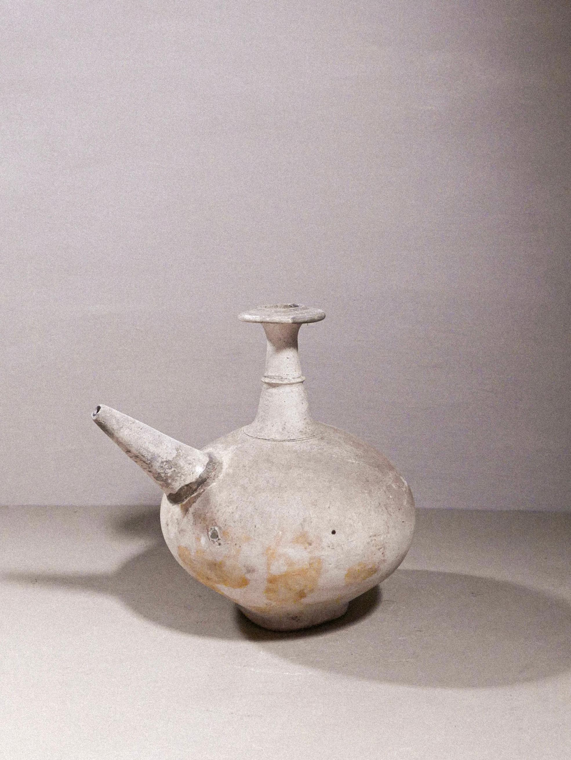 Earthenware holy water recipient from Java, Indonesia. The vessel is also known as “kendi”, and go back as far as the 13th-15th century, when some indigenous groups were still Christian. This period is referred to as the Majapahit Kingdom. They were