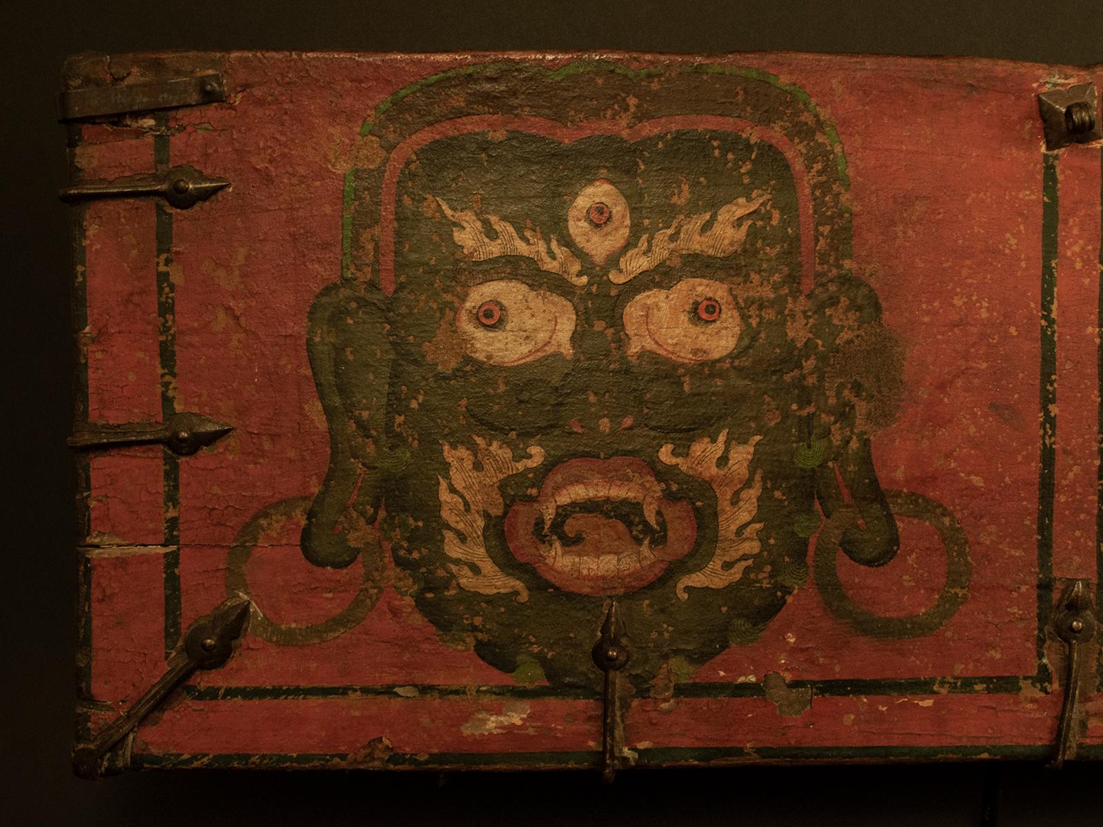 15th century tribal wood panel with Mahakala, Tibet

A dramatic wood panel from the front of an early Tibetan chest, with all the original mineral pigments and iron hardware. Mahakala is a guardian deity of Tibetan Buddhism and is often