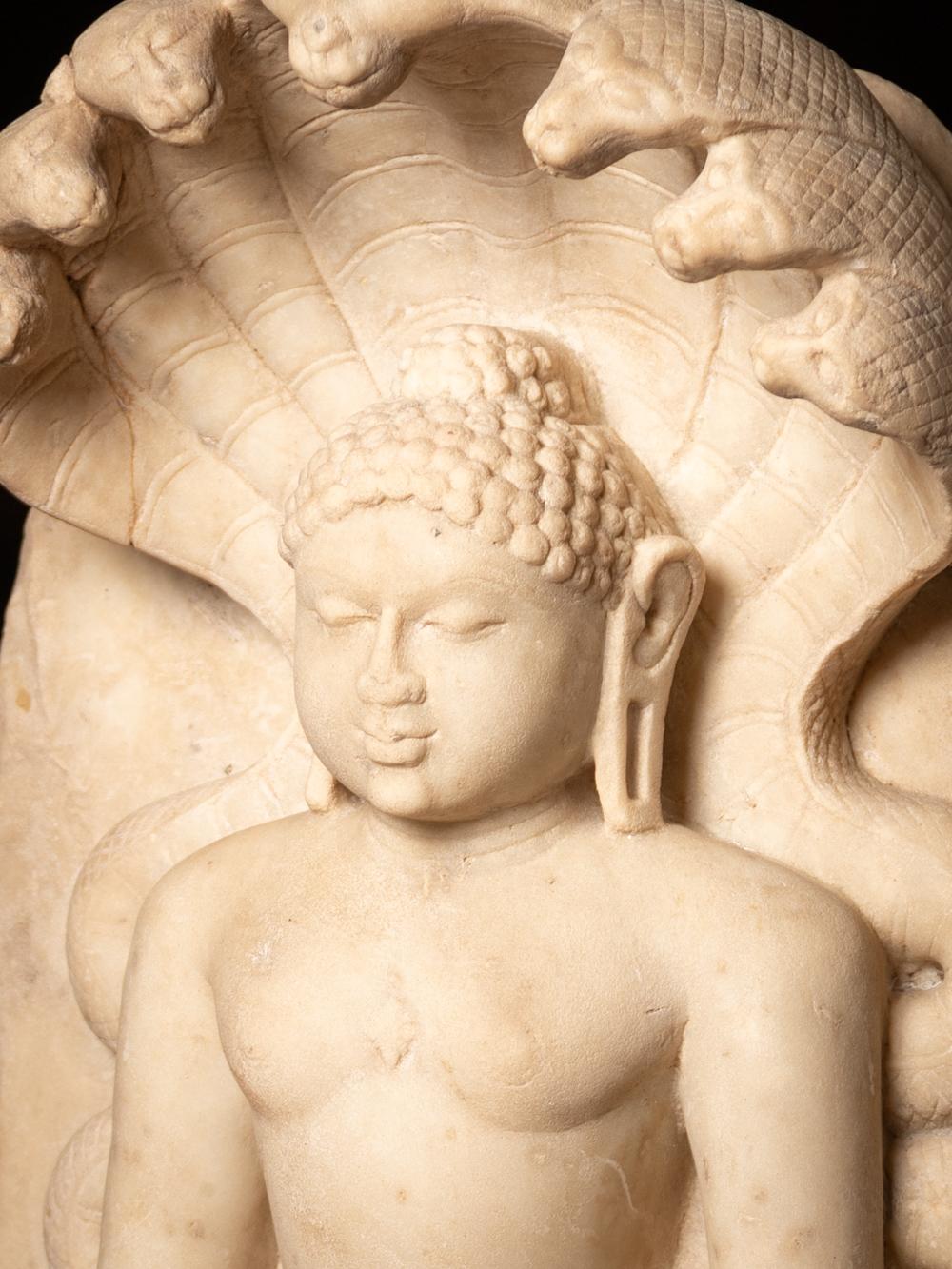 Material : marble
101 cm high
The black wooden base is 60 cm wide and 40 cm deep
The marble statue itself is 67 cm high
Dhyana mudra
15th century (or earlier)
Pictured is Parshvanatha, the 23rd Tirthankar
With snakes at the top and lions at the