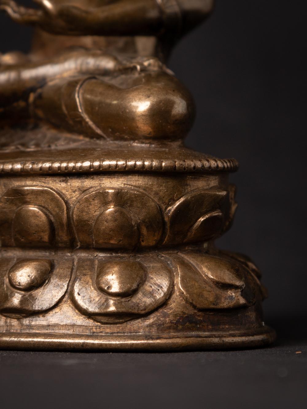 15th century Very special antique Tibetan Buddha statue in Bhumisparsha Mudra For Sale 8