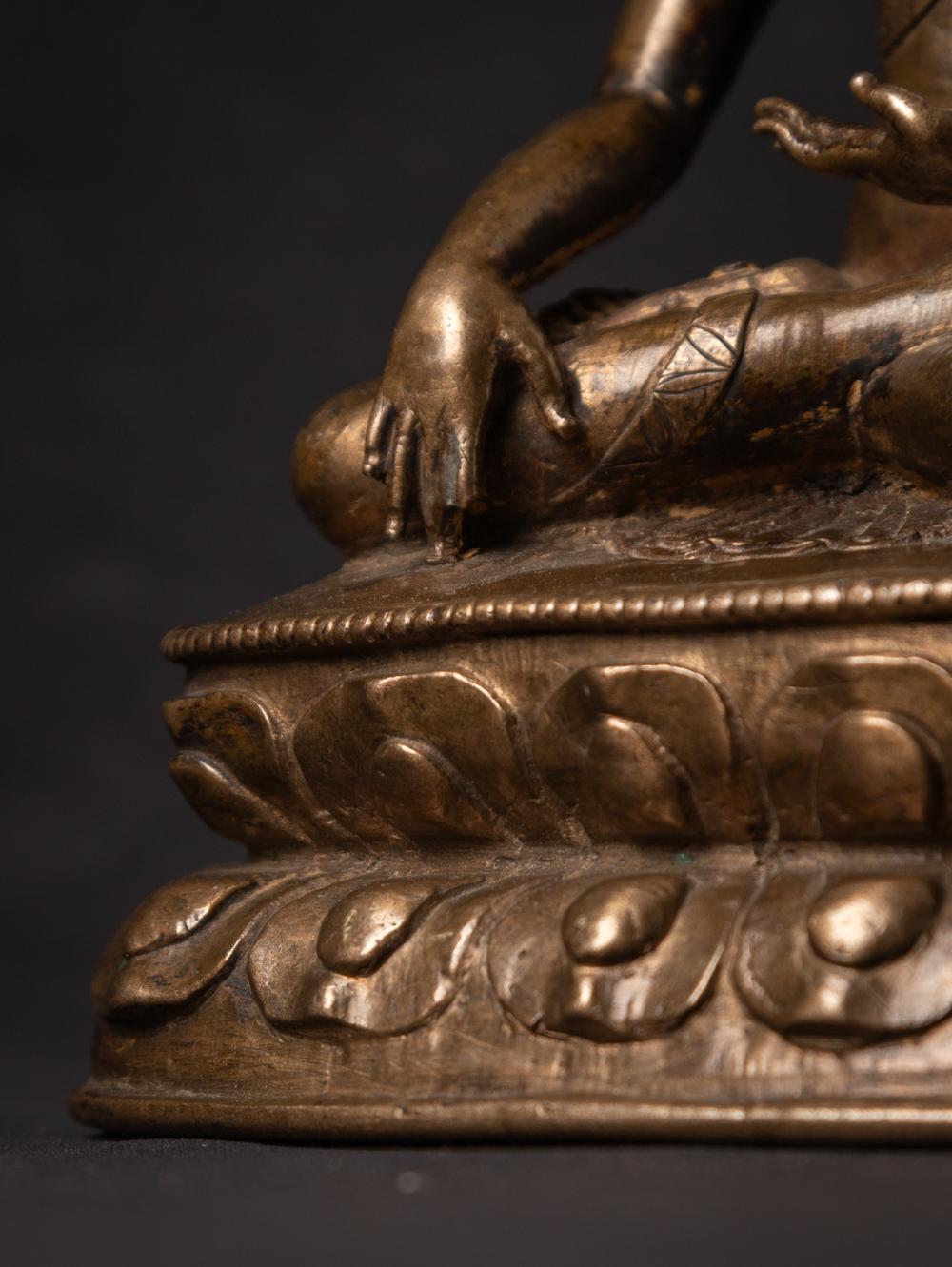 15th century Very special antique Tibetan Buddha statue in Bhumisparsha Mudra For Sale 9