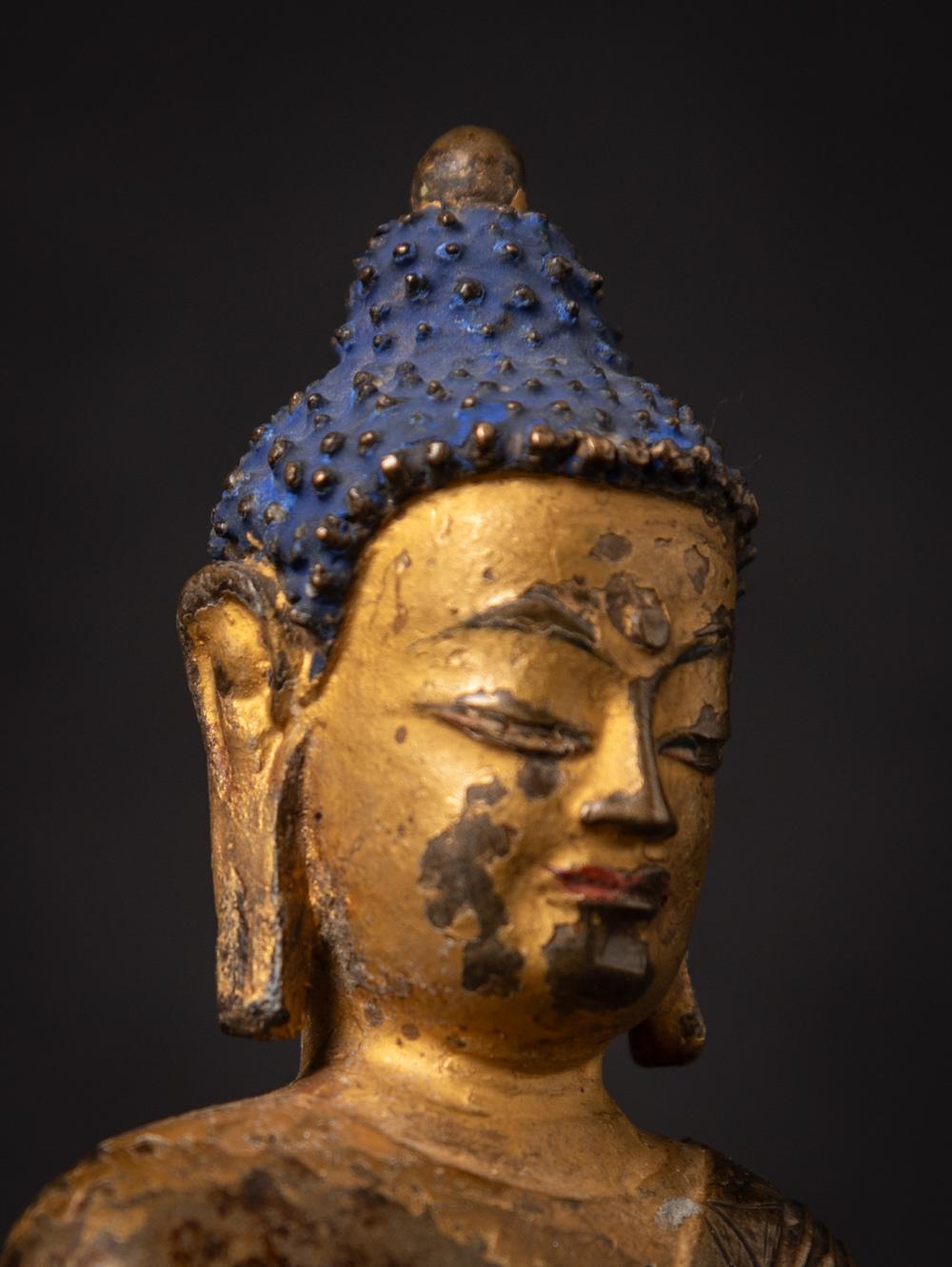15th century Very special antique Tibetan Buddha statue in Bhumisparsha Mudra For Sale 10