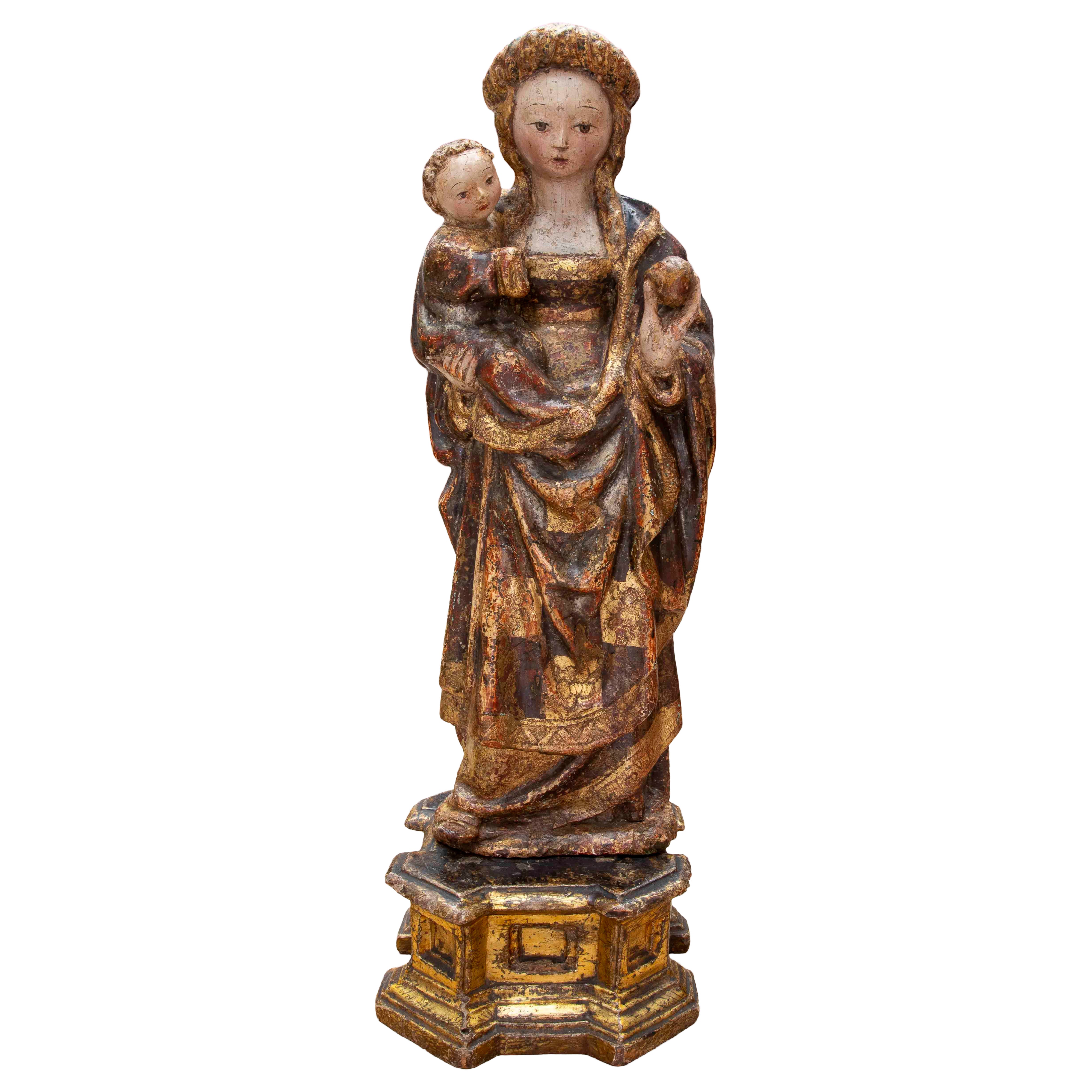 XVe Vierge et Child en bois polychrome et doré. Sur un piédestal. Malines.