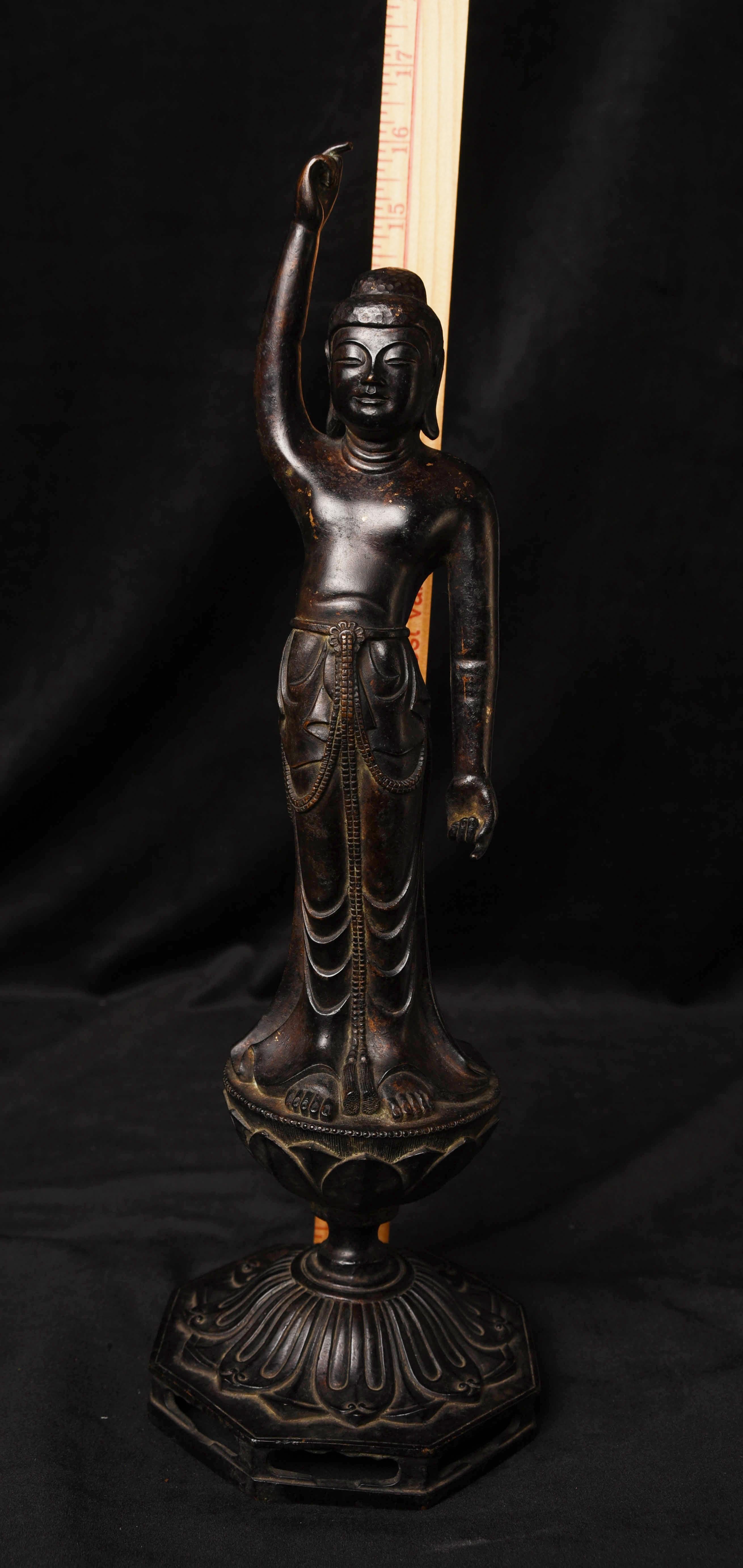 Baby Buddha- represents the Buddha right after his birth pointing toward Heaven and Earth so they can witness his first steps. Twenty years ago I had a near identical Japanese Baby Buddha. This one has a finer patina and may be more finely cast, but