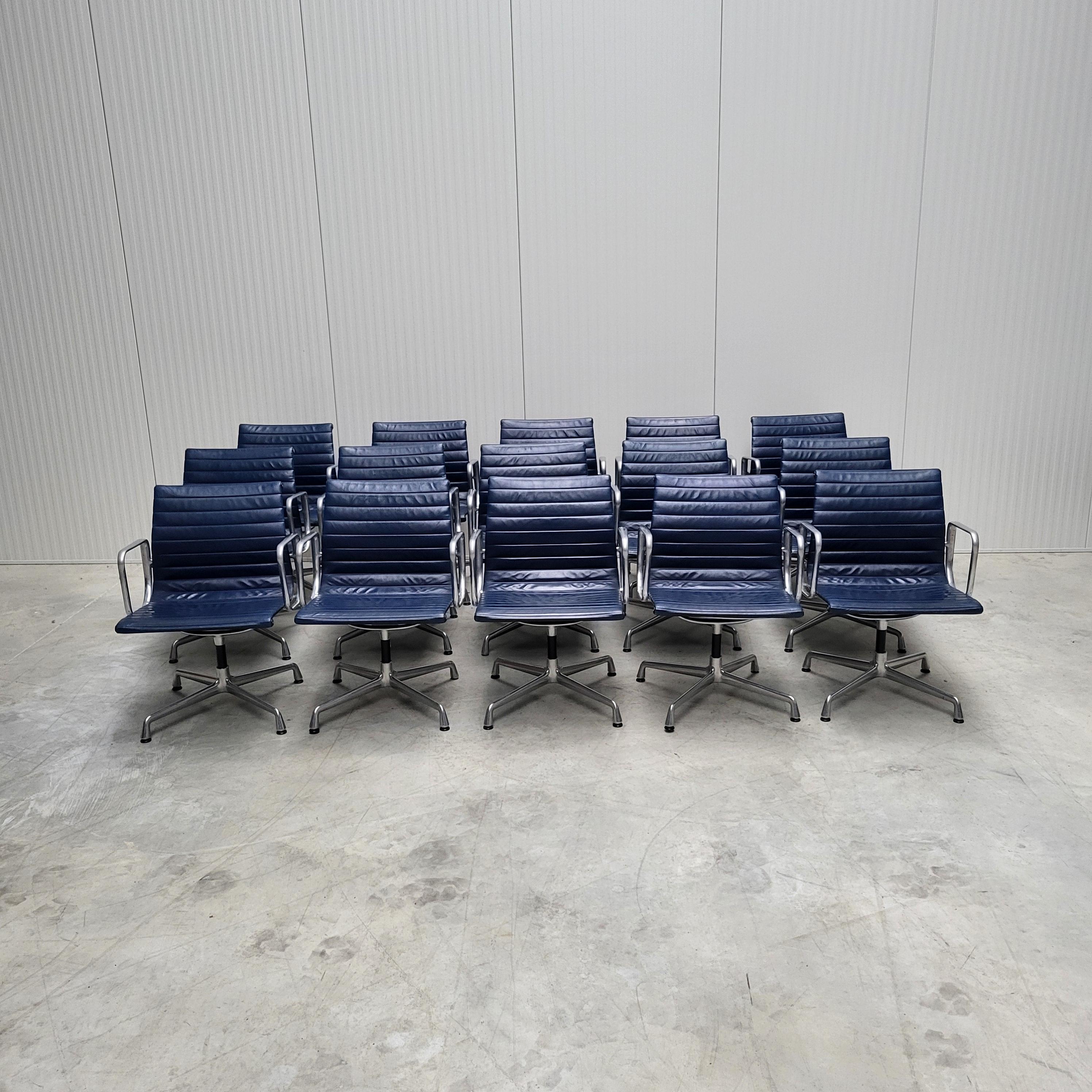 Nice blue leather aluminium chair model EA107 produced by Vitra. 
15x chairs are available!

The chairs features a polished aluminium frame and are all made in the end of the 80s/beginning 90s.

Perfect useable in a dining or conference room.

The