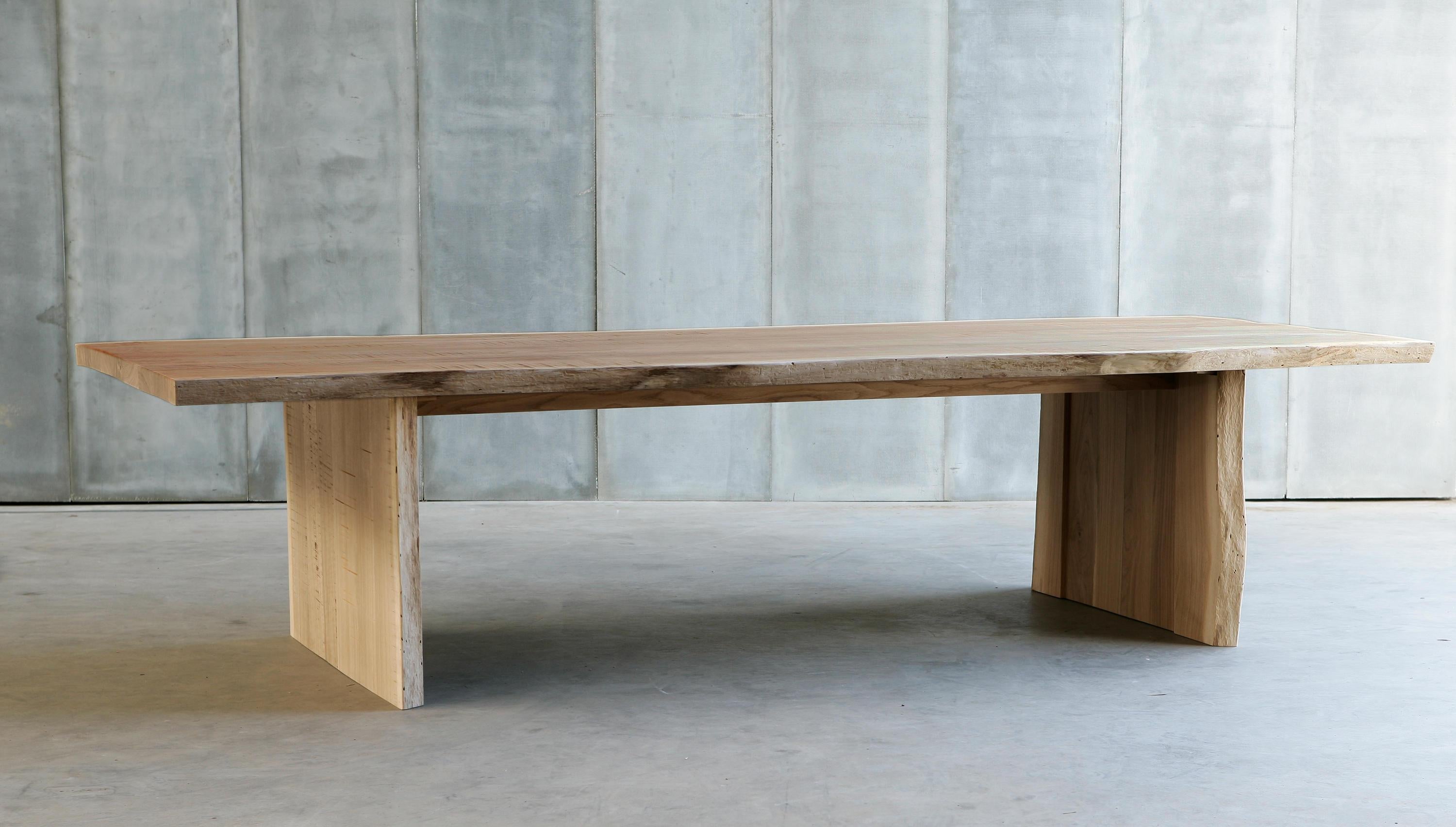 A dining table lends a unique charm and contemporary style , It is made of oak wood. 
Fixed table base designed to give maximum stability, as well as contributing to its unusual aesthetic.
Made from solid oak wood and finished with oil, the table is