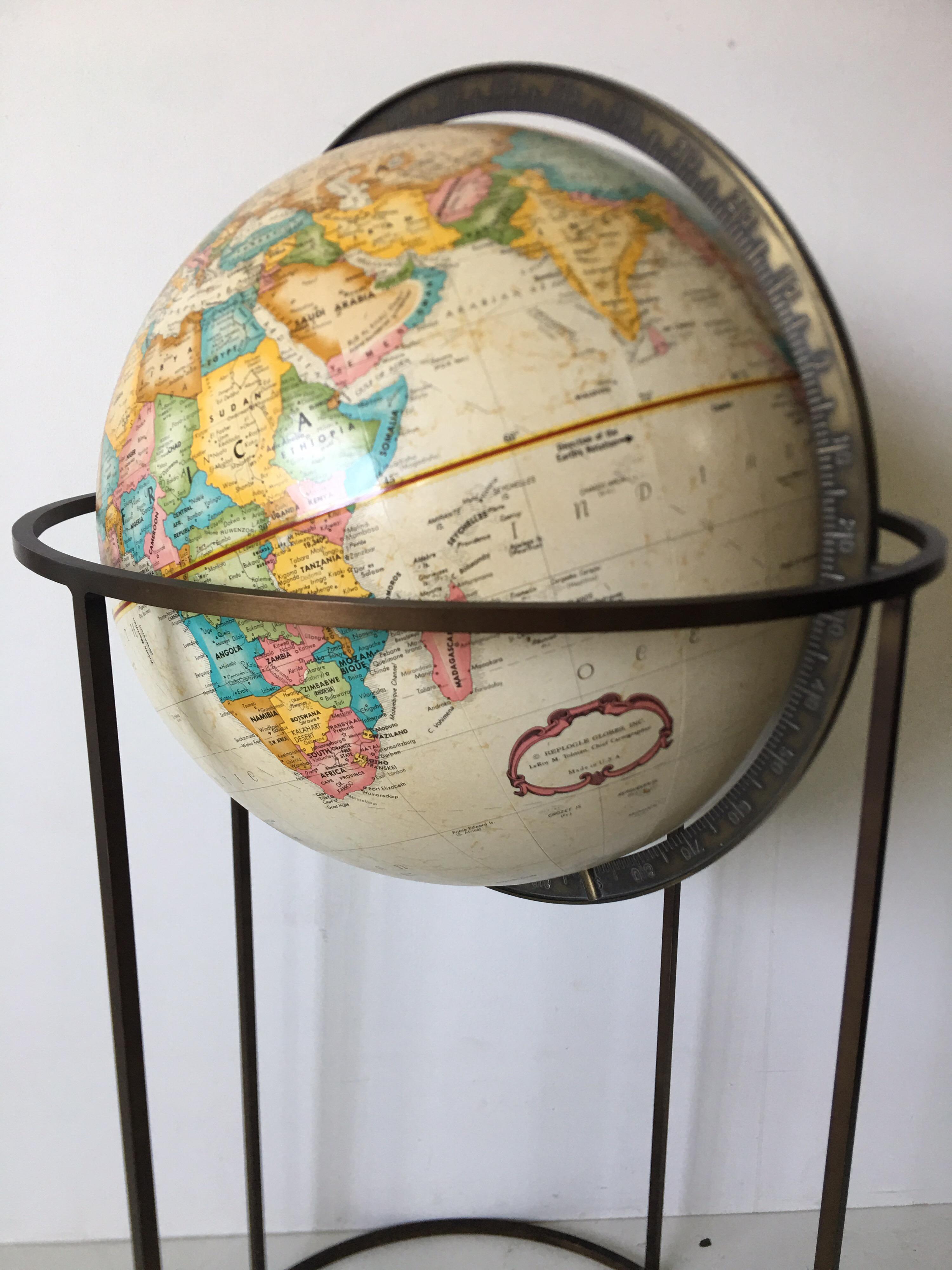 This is a nice larger size world globe by Replogle. It is 16