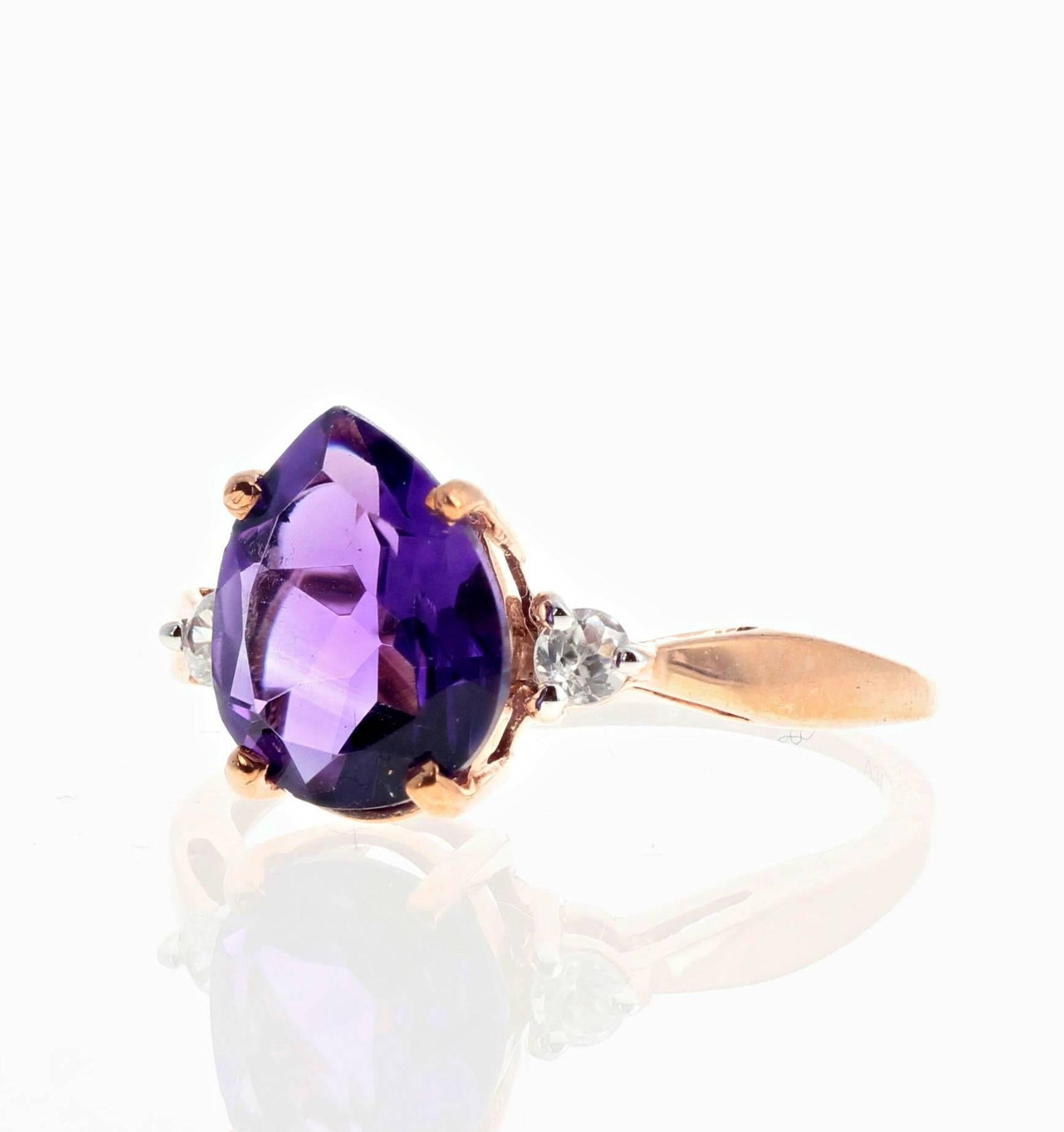 Brilliant purple pear cut 1.6 carat Amethyst (10.2 mm x 8 mm) enhanced with sparkling little white diamonds set in a unique handmade rose gold ring size 6 (sizable)  More from this seller by putting gemjunky into 1stdibs search bar.