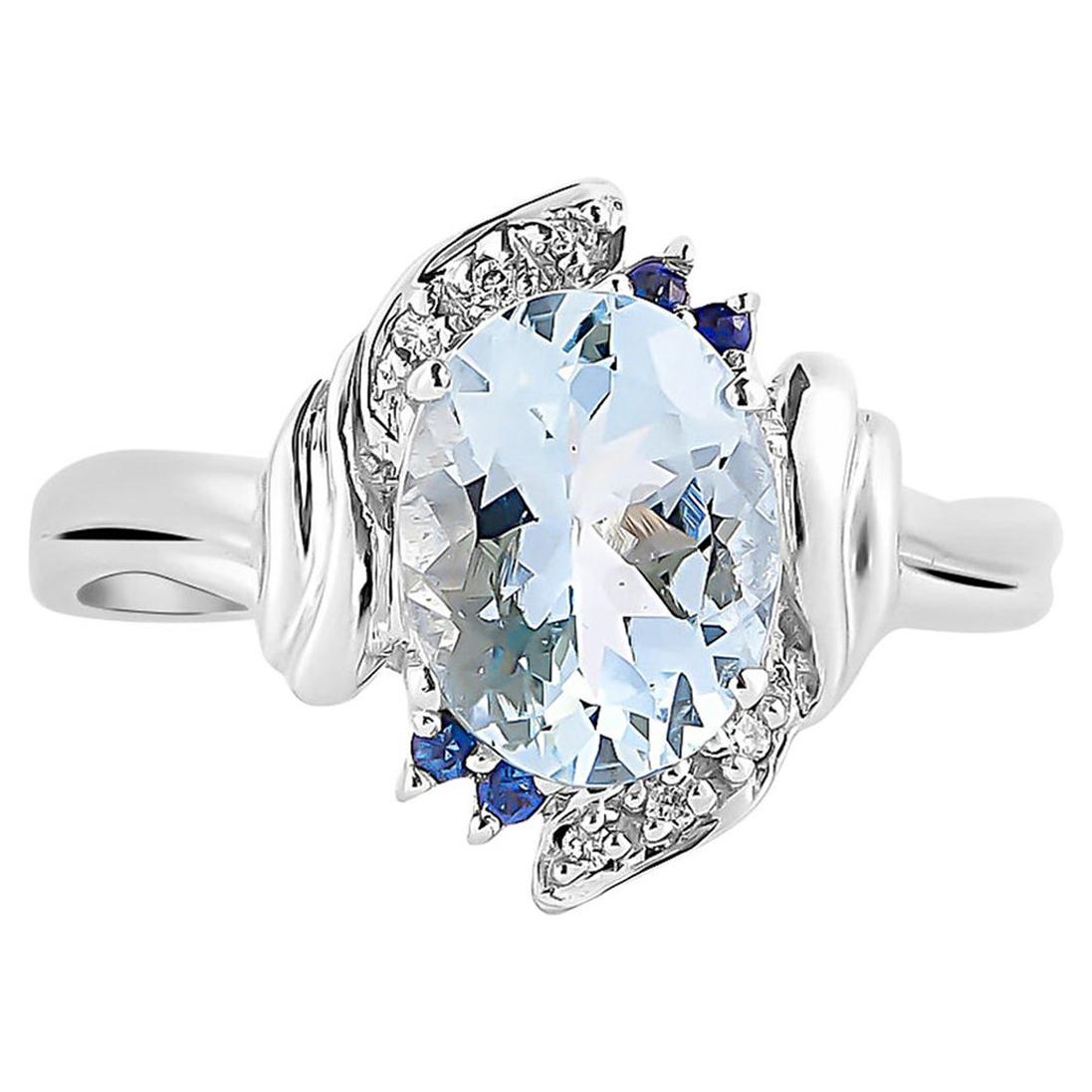 Bague en or blanc 14 carats avec aigue-marine de 1,6 carat, saphir bleu et diamants en vente