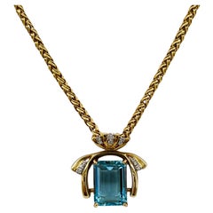 Collar de Aguamarina Corte Esmeralda y Diamante Blanco de 16 Quilates en Oro Amarillo de 14K