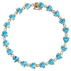 16 Carat Blue Topaz Bracelet Tennis Line Estate 14K Gold Trillion Cut Jewelry