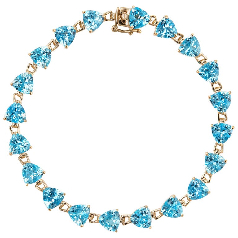 16 Carat Blue Topaz Bracelet Tennis Line Estate 14K Gold Trillion Cut