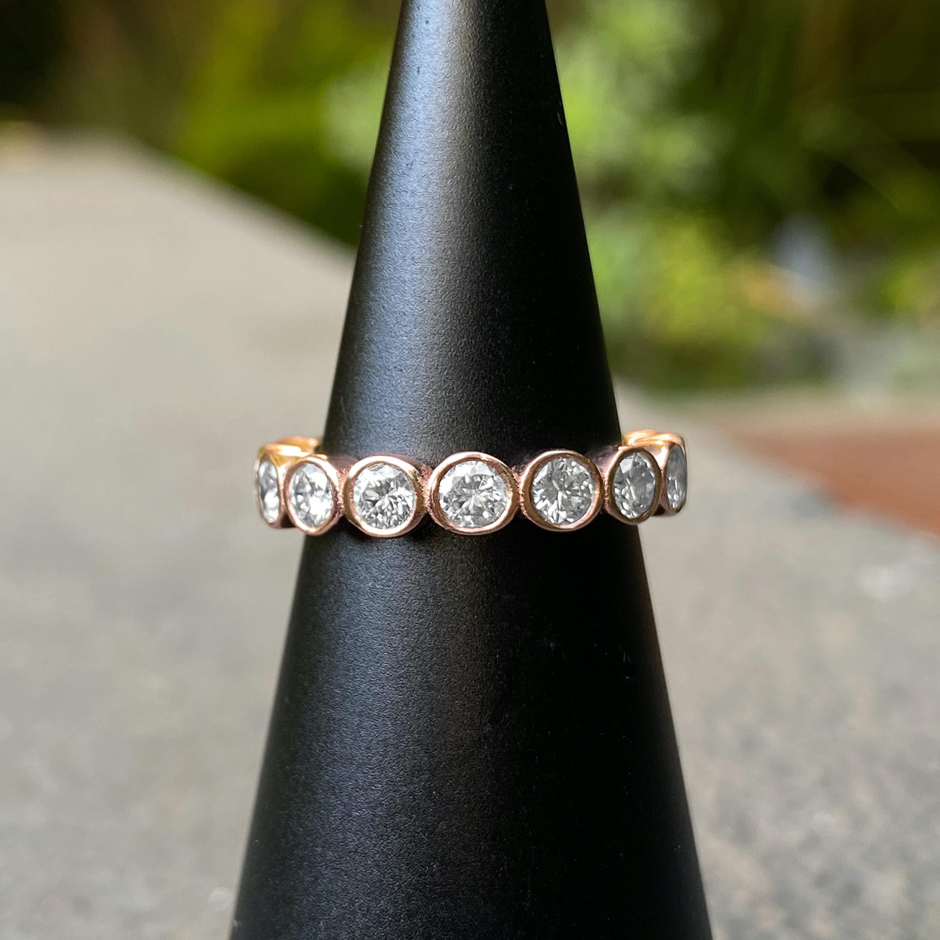 Eytan Brandes designed this prong-free eternity band with 16 generously sized diamonds as a wedding band, but it makes a great stacker, and it's substantial enough to be worn solo as well.  

This ring features H-color, VS2 clarity full-cut,