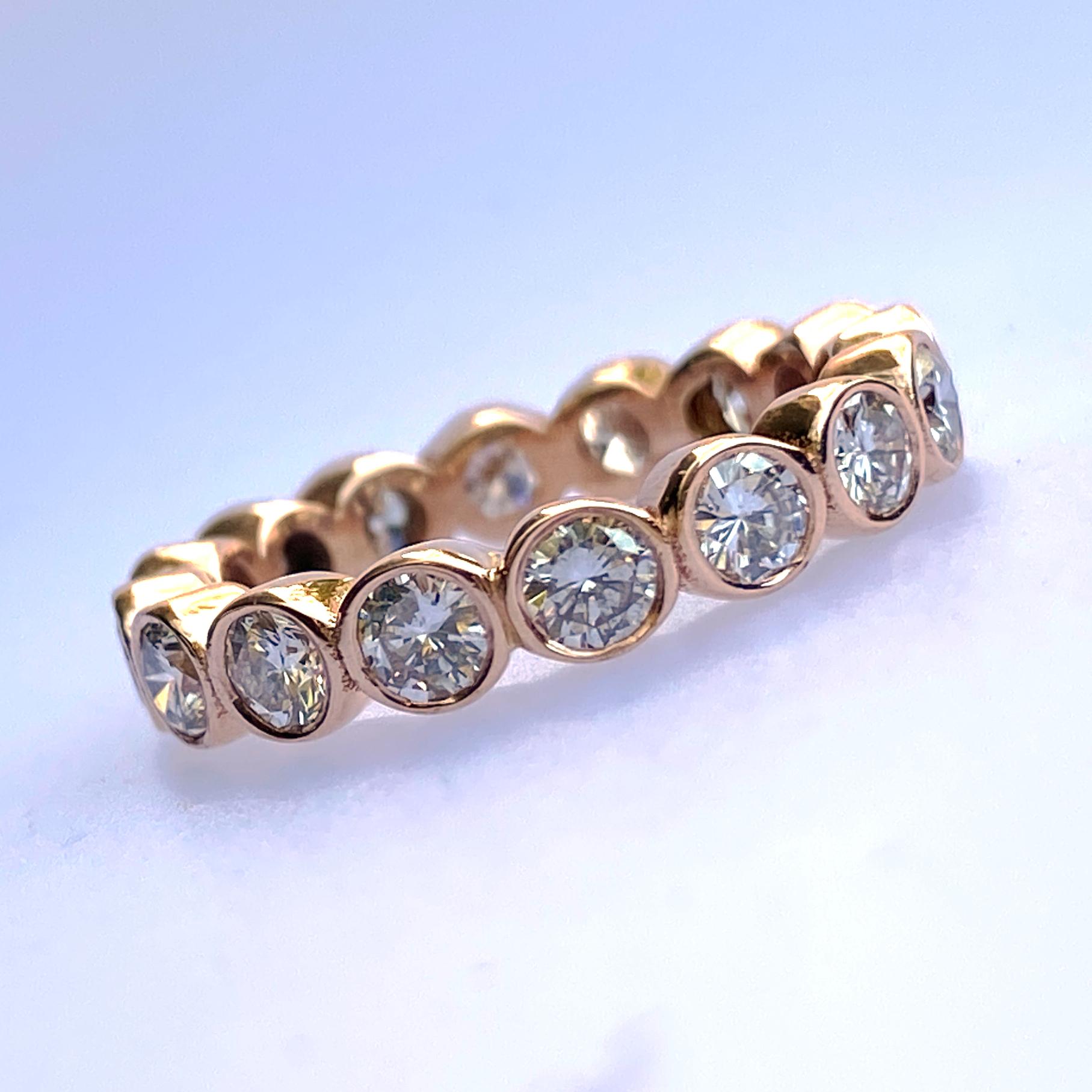 Brilliant Cut 1.6 Carat Diamond Eternity Band with Open Bezels in Rose Gold For Sale