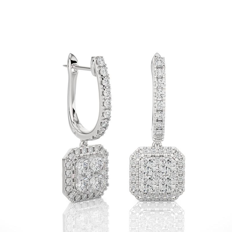 The Moonlight Cushion Cluster Lever Back Earrings are a radiant masterpiece, crafted from 3.94 grams of 14K white gold. These earrings showcase a stunning cluster of 78 excellent round diamonds, totaling 1.6 carats. The design is both elegant and