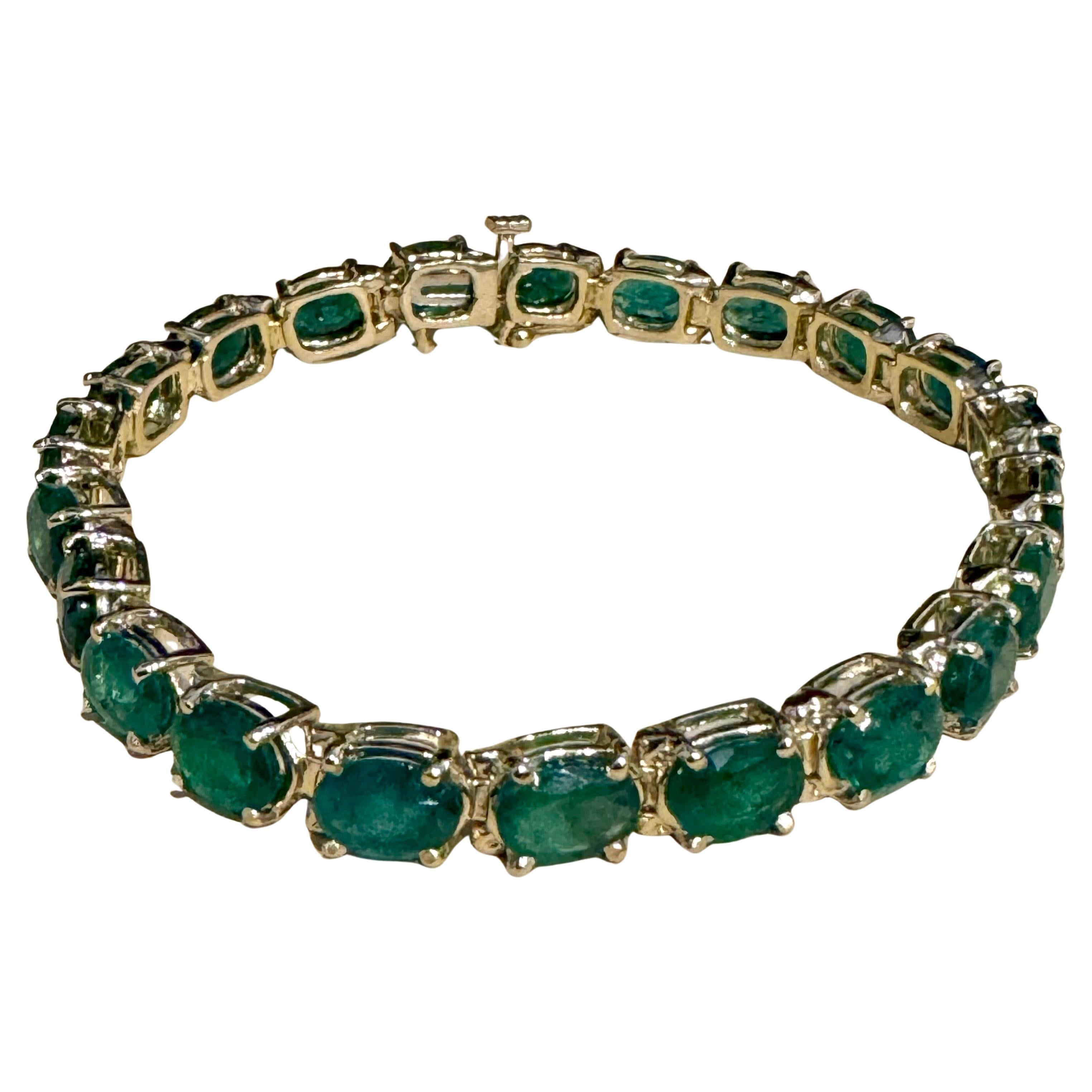  This exceptionally affordable Tennis  bracelet has  29  stones of oval  Emeralds  .  Total weight of the Emeralds is  approximately 16 carat. 
The bracelet is expertly crafted with 11.2  grams of  14 karat Yellow  gold . Have a safety clasp