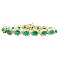 16 Carat  Oval Cut Emerald and Diamond Tennis Bracelet 14 Karat Yellow Gold