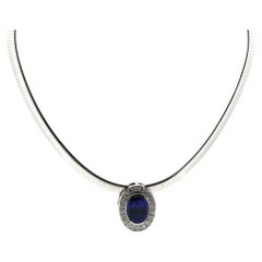 16 Carat Oval Tanzanite Gemstone Diamond Pendant Omega Necklace Platinum/14KWG