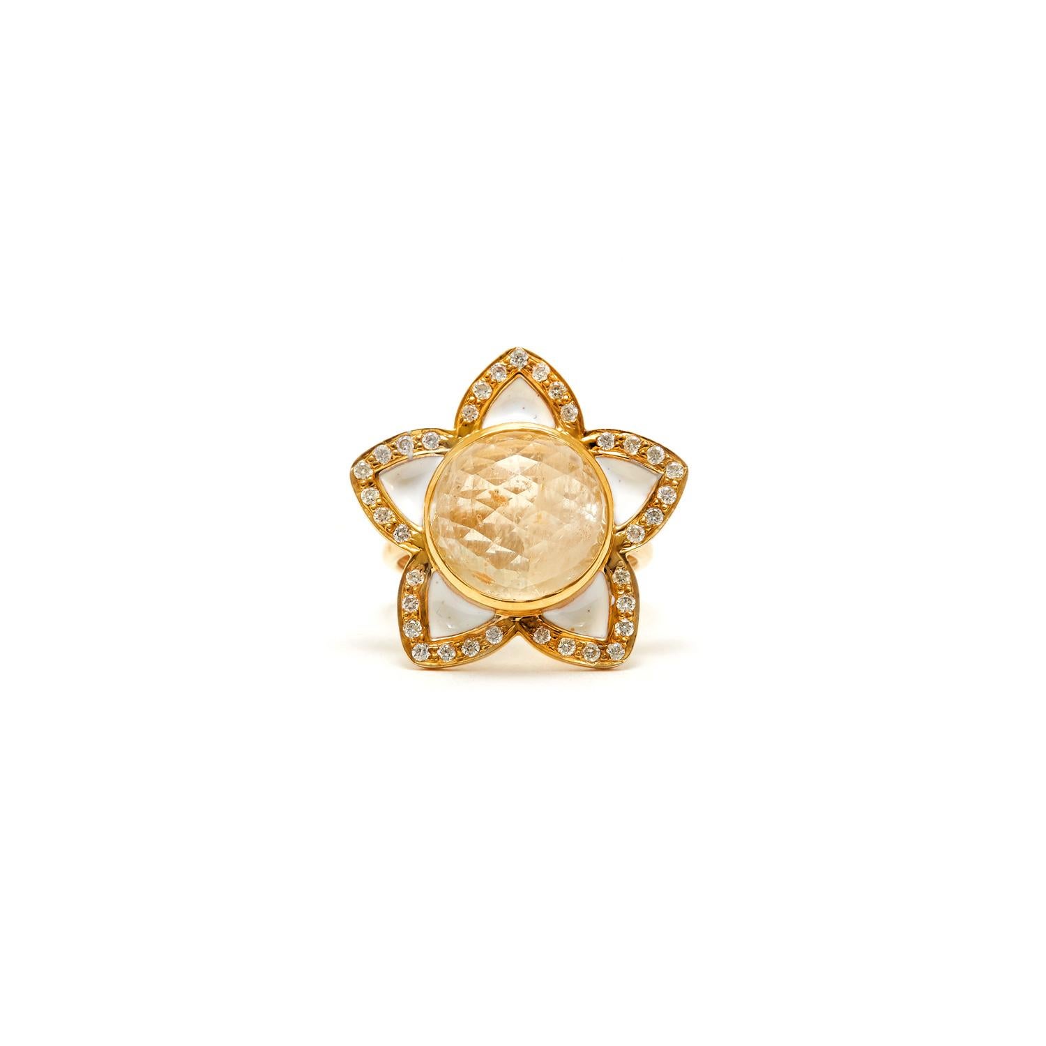 A 16 Carat Yellow Sapphire Champagne Diamond Enamel Cocktail  Ring. 
A luminescent checker cut dome yellow sapphire in a glossy white enamel star setting accented with champagne diamonds  and set in 18 karat gold.

- Yellow Sapphire 16.26 karats 
-