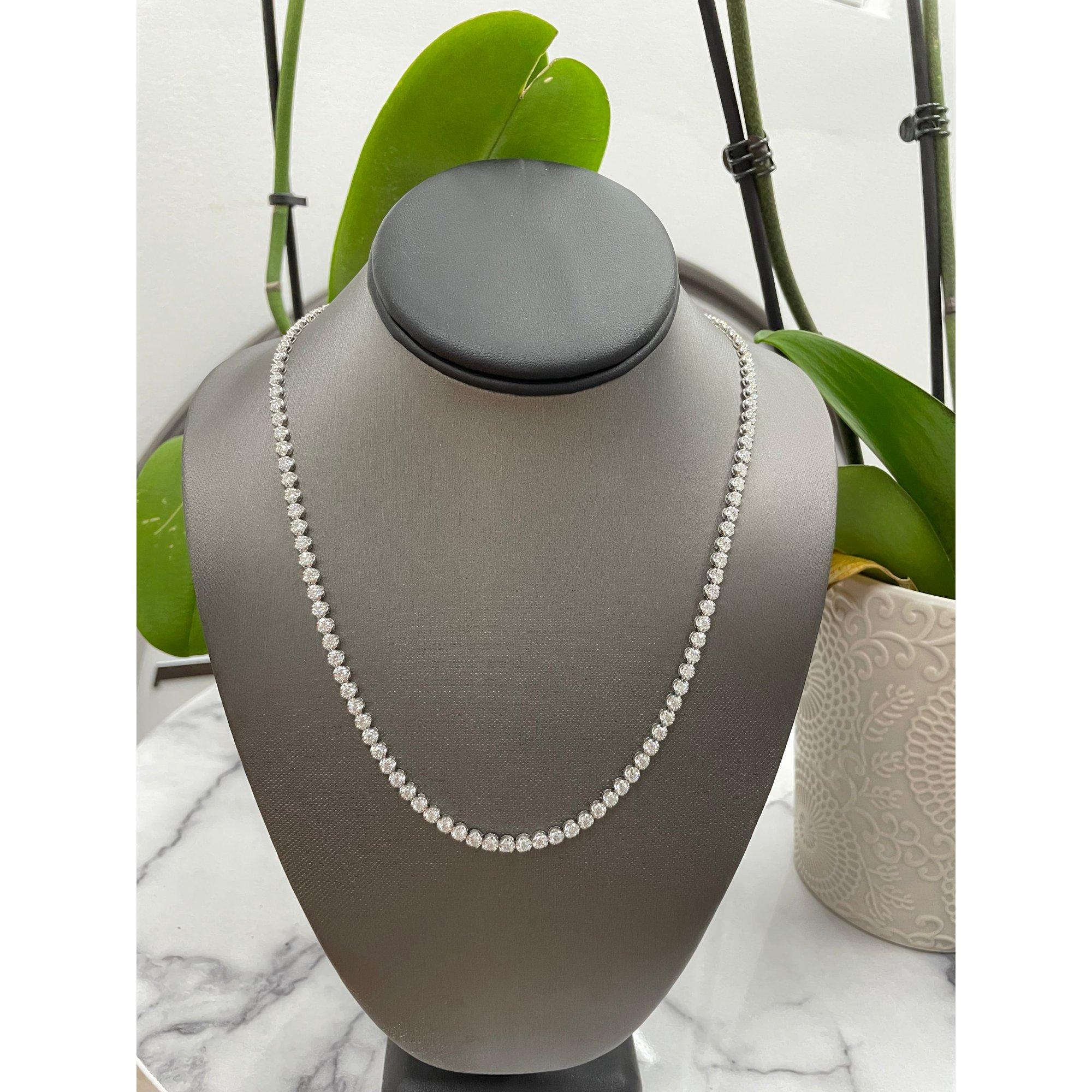 Carat Weight: 16ct Round Diamond
Metal Type: 14kt White Gold
Color Grade:	D/F
Clarity: VVS2
Necklace Length: 16 Inch