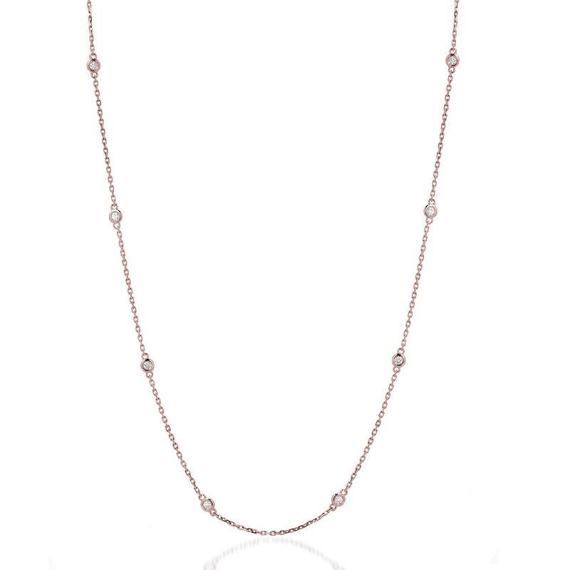 Eight elegant round diamonds set in a bezel setting along a 14k gold chain necklace.

Gold: 14K Gold
Number of Diamonds: Eight
Gold Color: Rose Gold
Carat: 0.50 Carat
Necklace Length: 16 Inches
Diamond Clarity: VS
Diamond Color: F
Chain Type: