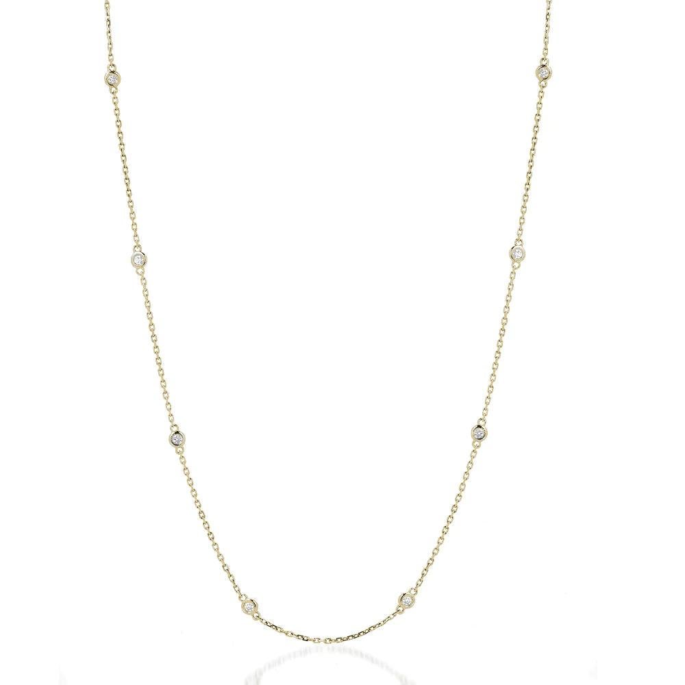 Eight elegant round diamonds set in a bezel setting along a 14k gold chain necklace.

Gold: 14K Gold
Number of Diamonds: Eight
Gold Color: Yellow Gold
Carat: 1 Carat
Necklace Length: 16 Inches
Diamond Clarity: VS
Diamond Color: F
Chain Type: